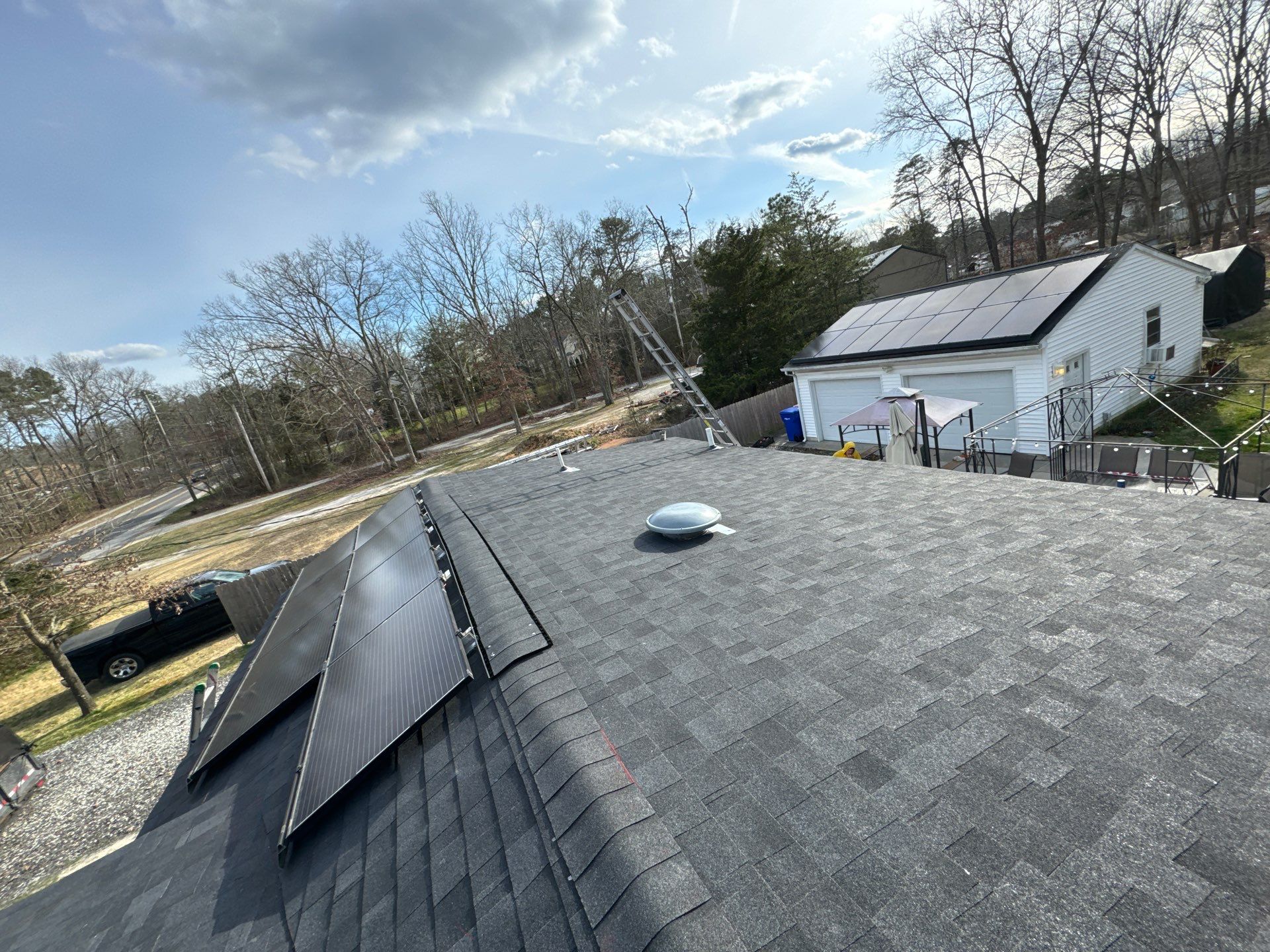Onyx Black Shingles by Reimagine Roofing