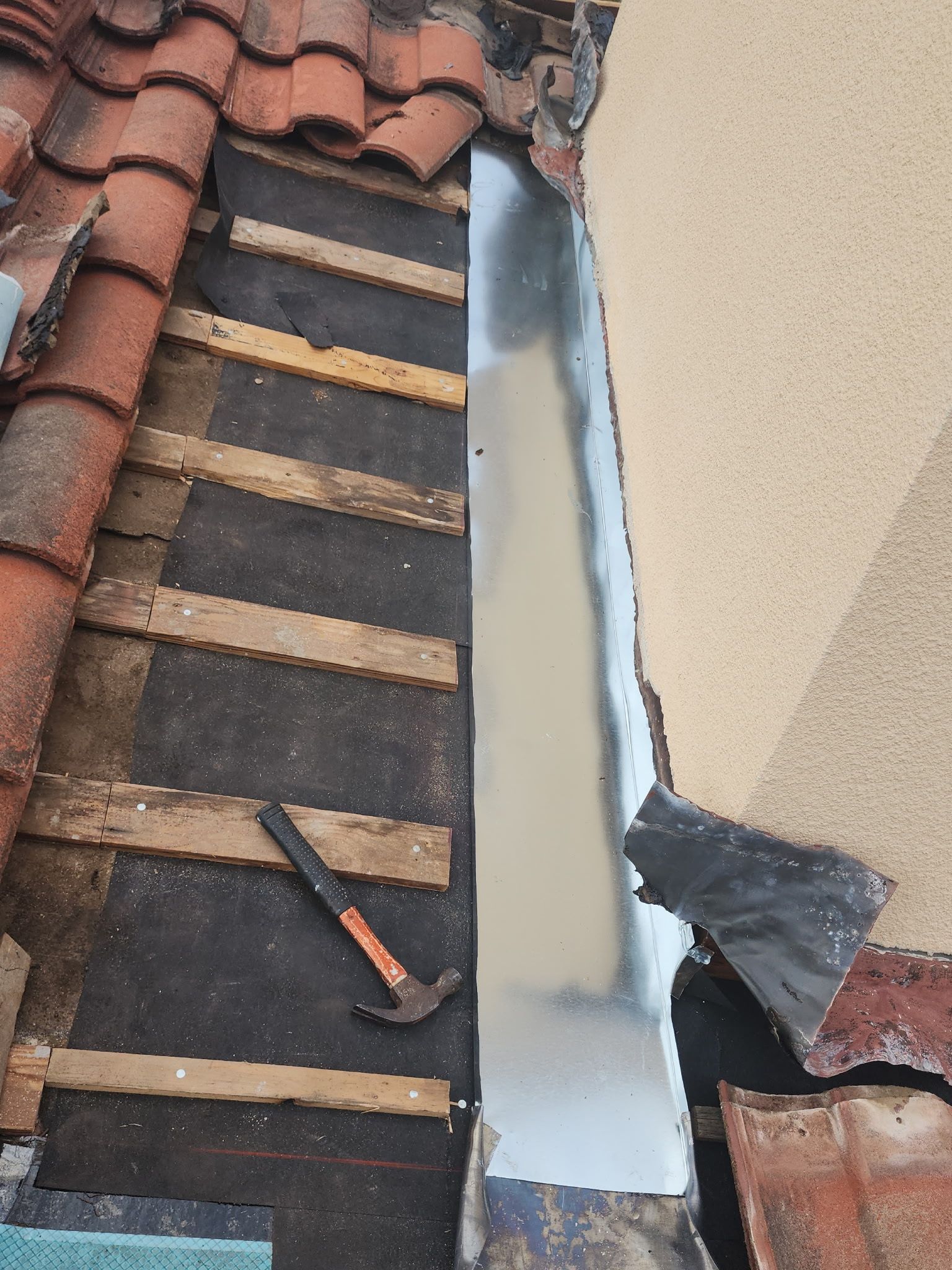 Specializing in tile roof repairs by REPS Austin Area Roofer
