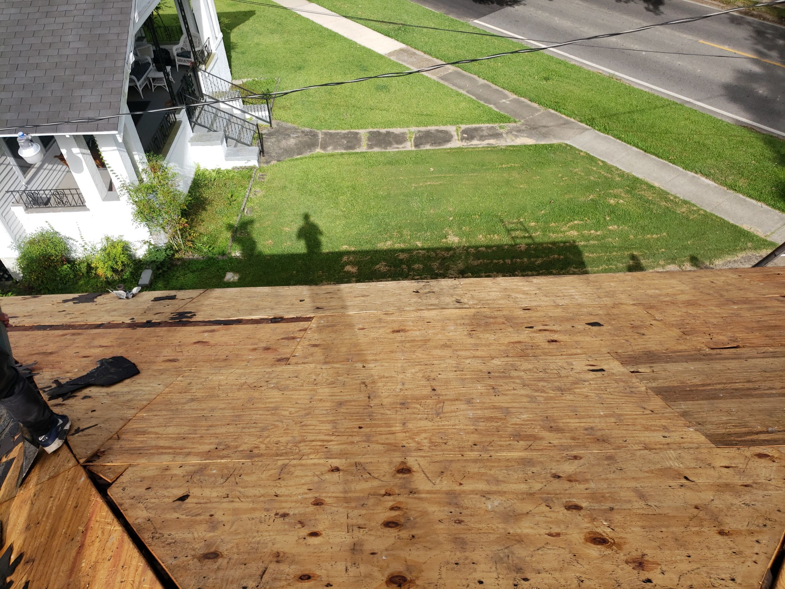 Residential Roofing Installation using Roof Replacement by American Roofing & Construction LLC