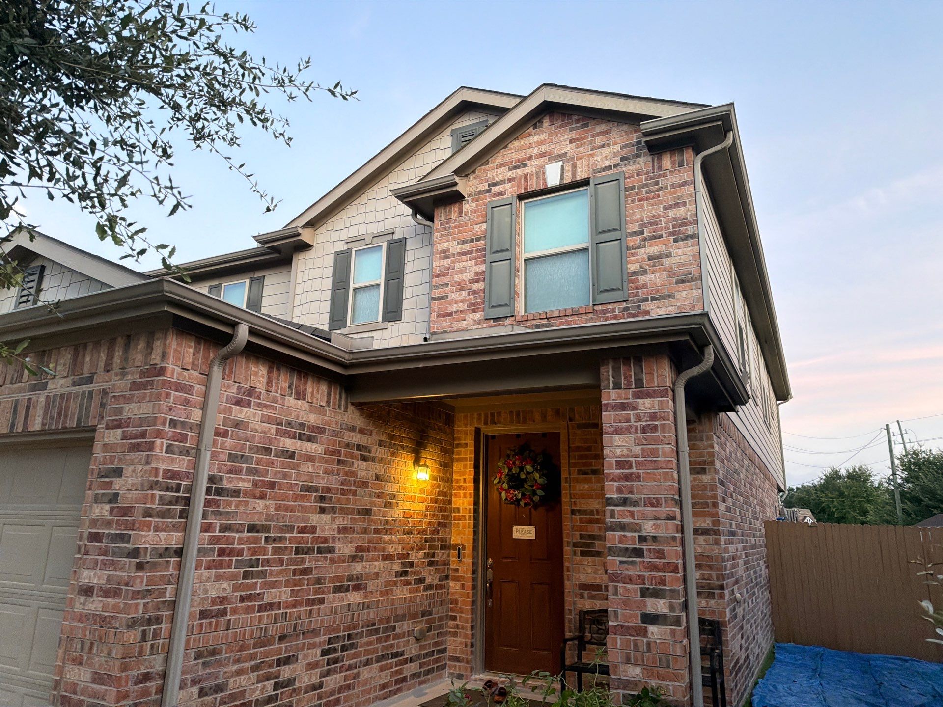 Owens Corning Shingle Roofing Replacement for Houston Two-Story Home by Houston Roofing & Construction