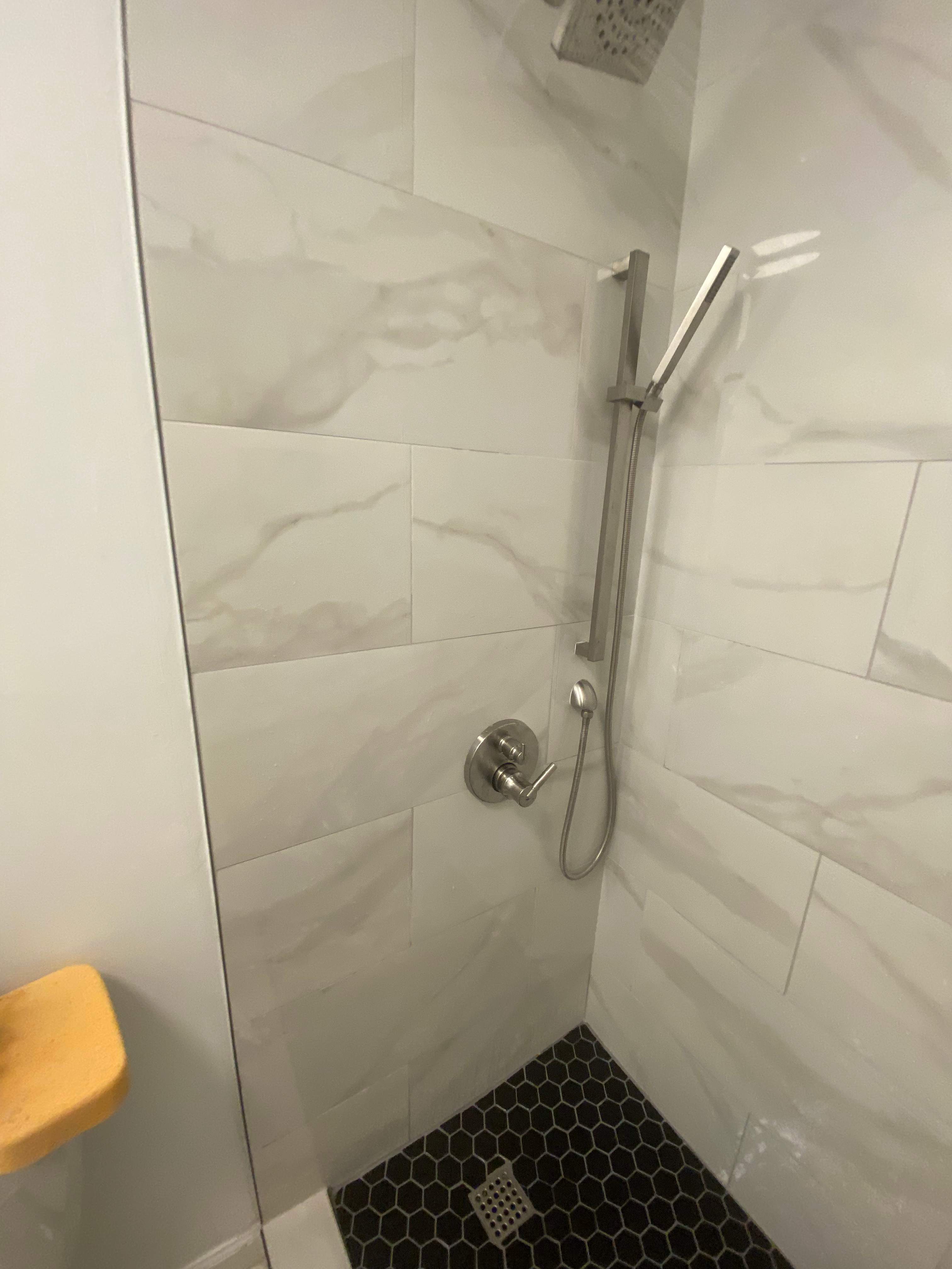 Tub to walk-in shower conversion by Prudencio