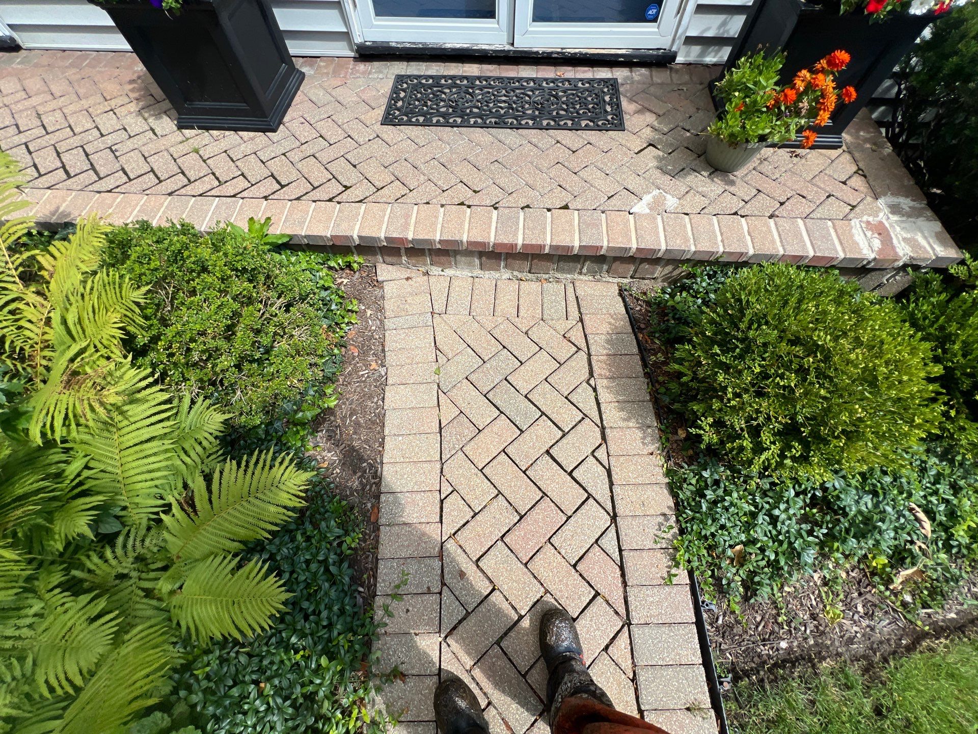 Brick paver clean, sand and seal.  using Polysweep polymeric sand by Northern Power Washing LLC.