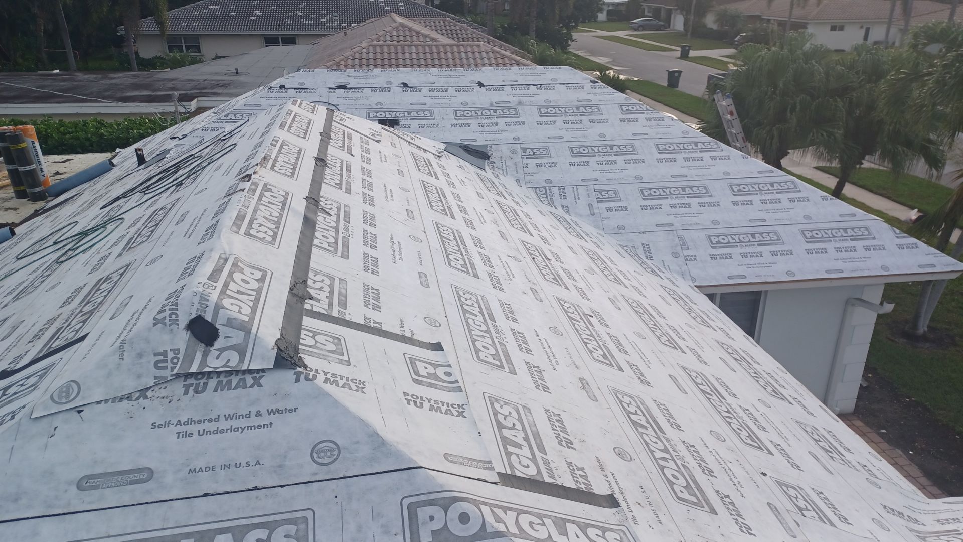 Residential Roofing Installation using 1" Nail strip metal roof by BLUES BROTHERS ROOFING