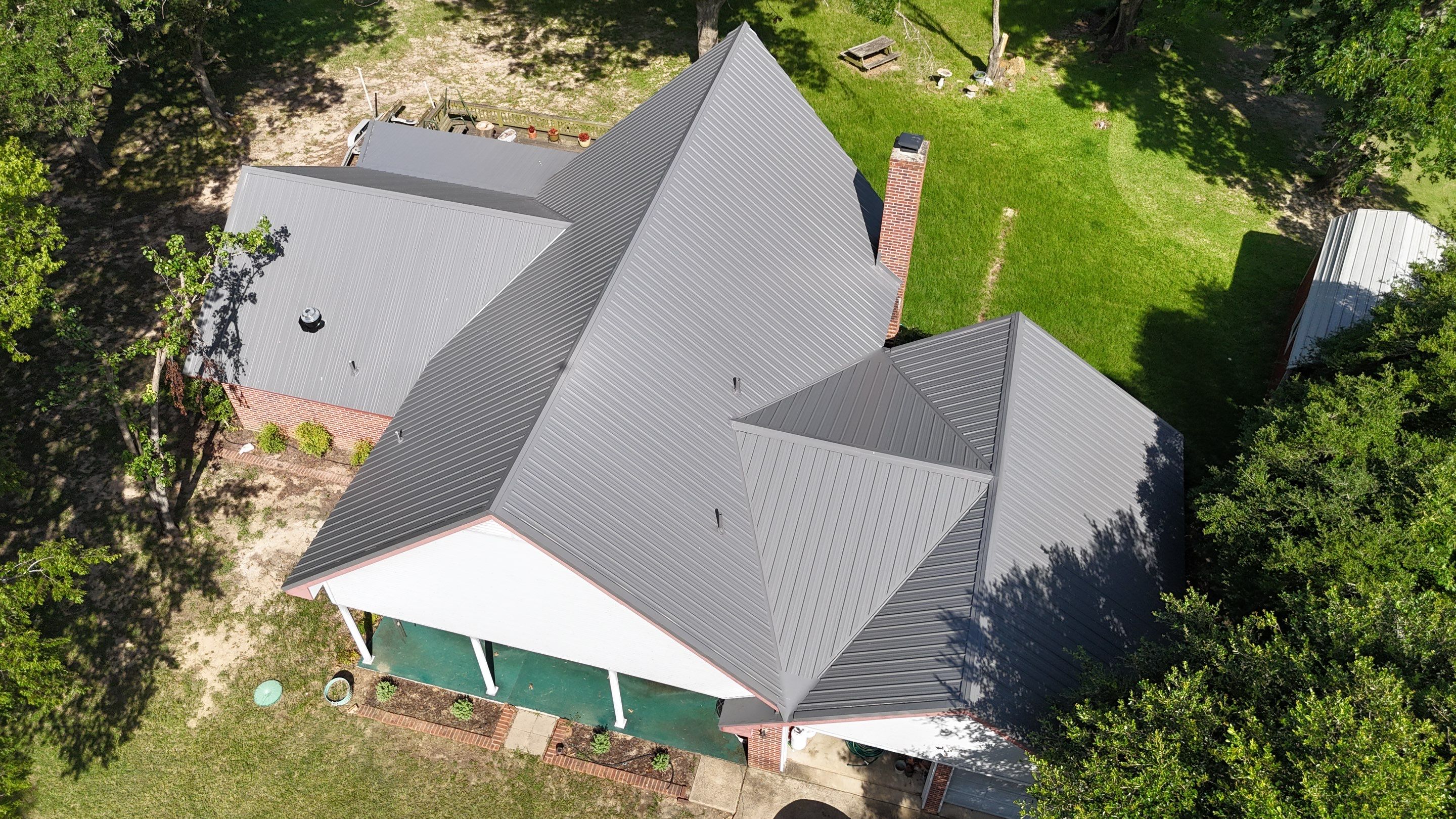 Charcoal Metal Roof at Lake Limestone, Tx by DT Roofing - Seth Wells