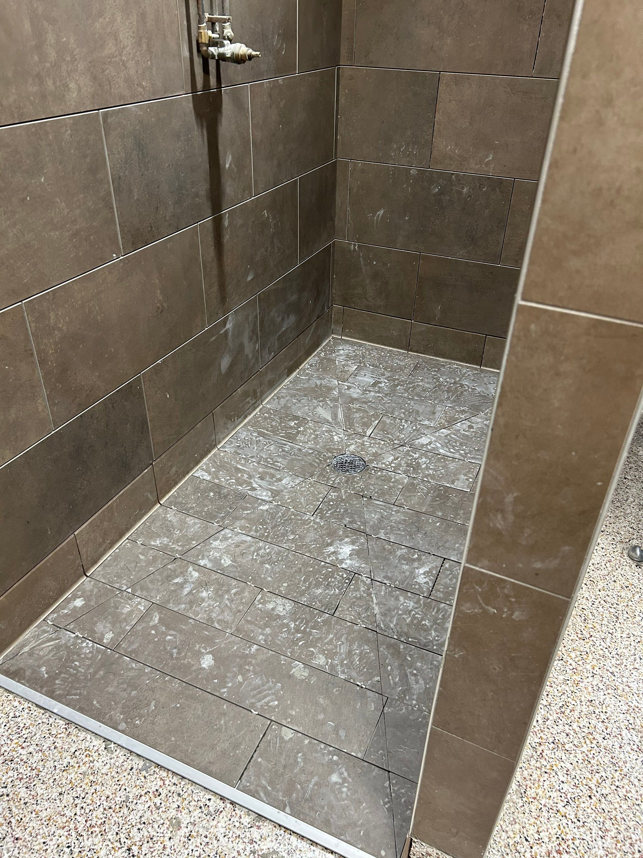 Trucking company showers by Footprints Floors of Nashville