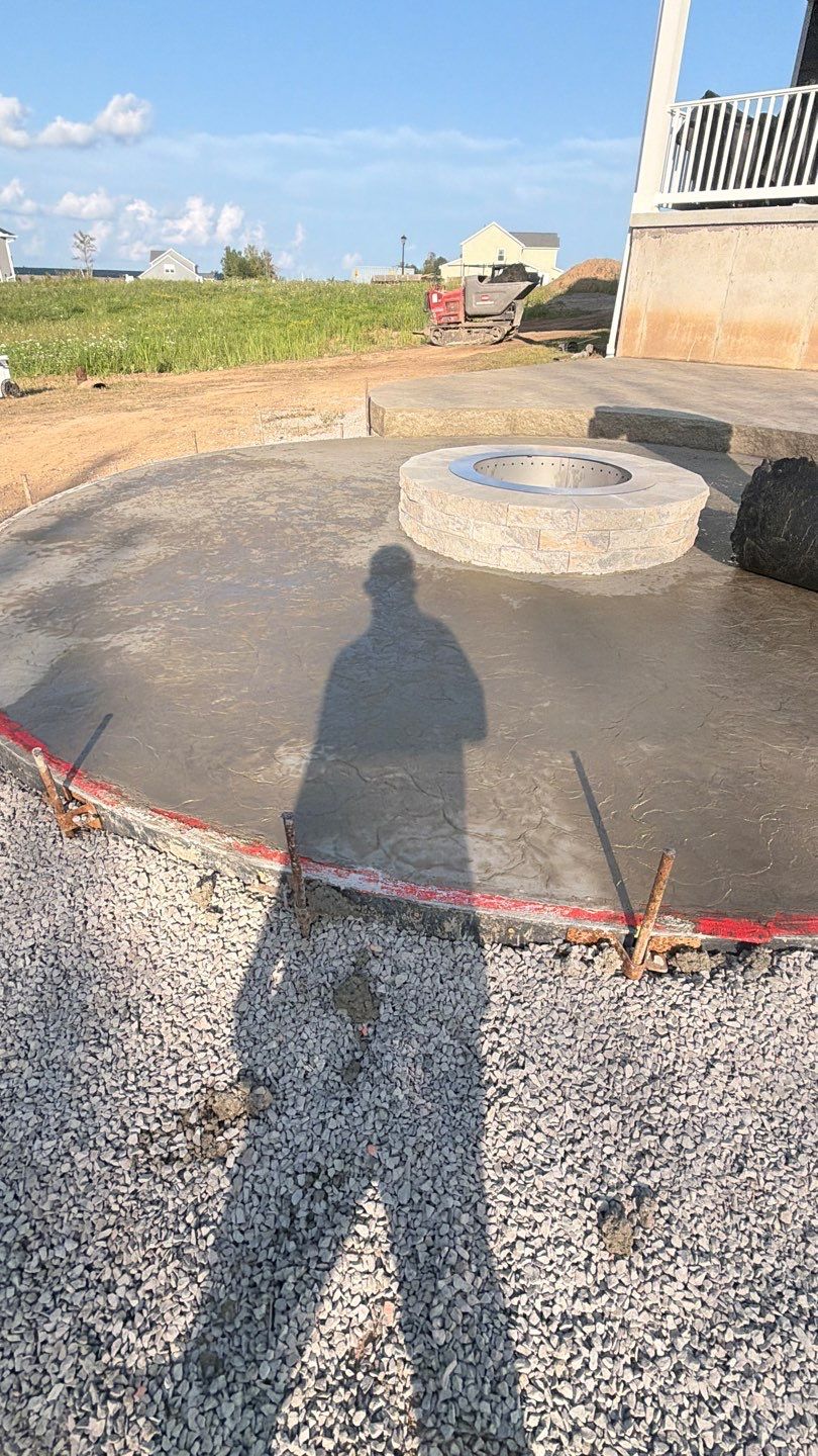 Oxford Slate Patio with Fire Pit by NG Masonry & Construction LLC