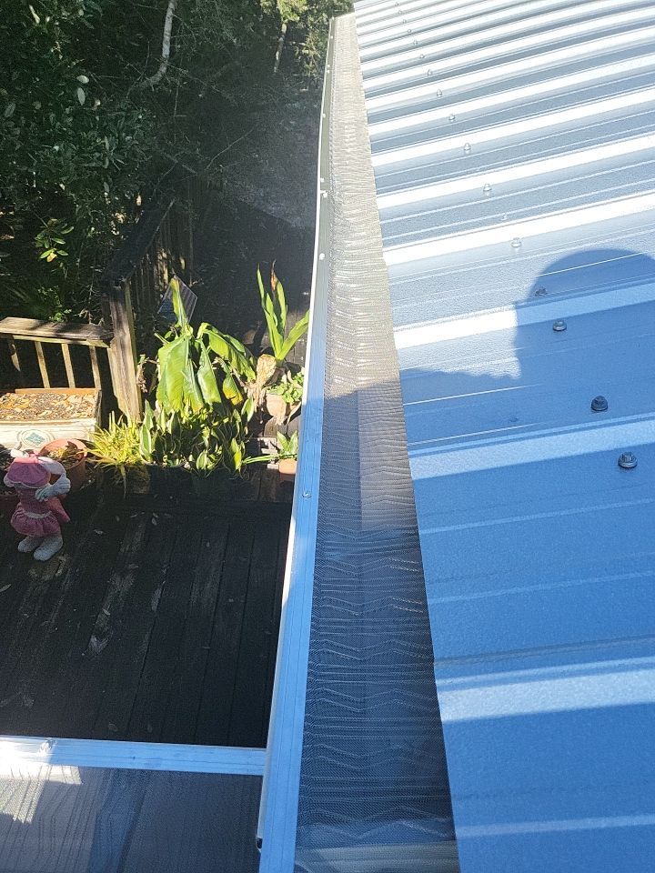 Gutter Installation using K-Style Seamless Gutters and LeafBlaster Pro Gutter Guards by Gutter Professors
