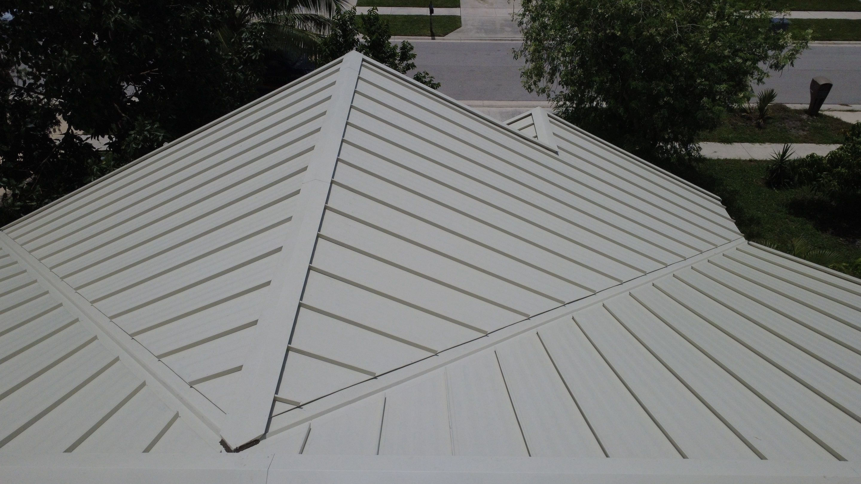 Residential Roofing Installation using 1.5'' Mechanical Seam by BLUES BROTHERS ROOFING