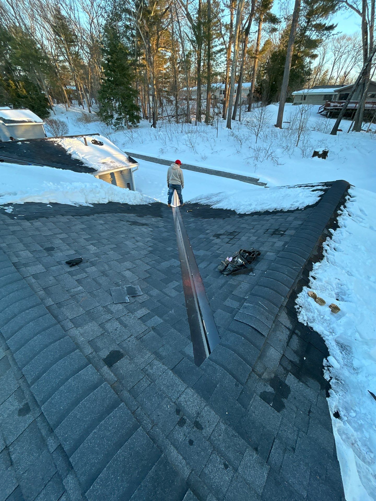 Ridge Cap Replacement & Black Metal Valley Installation in Chelmsford, MA by Mighty Dog Roofing of Greater Middlesex County