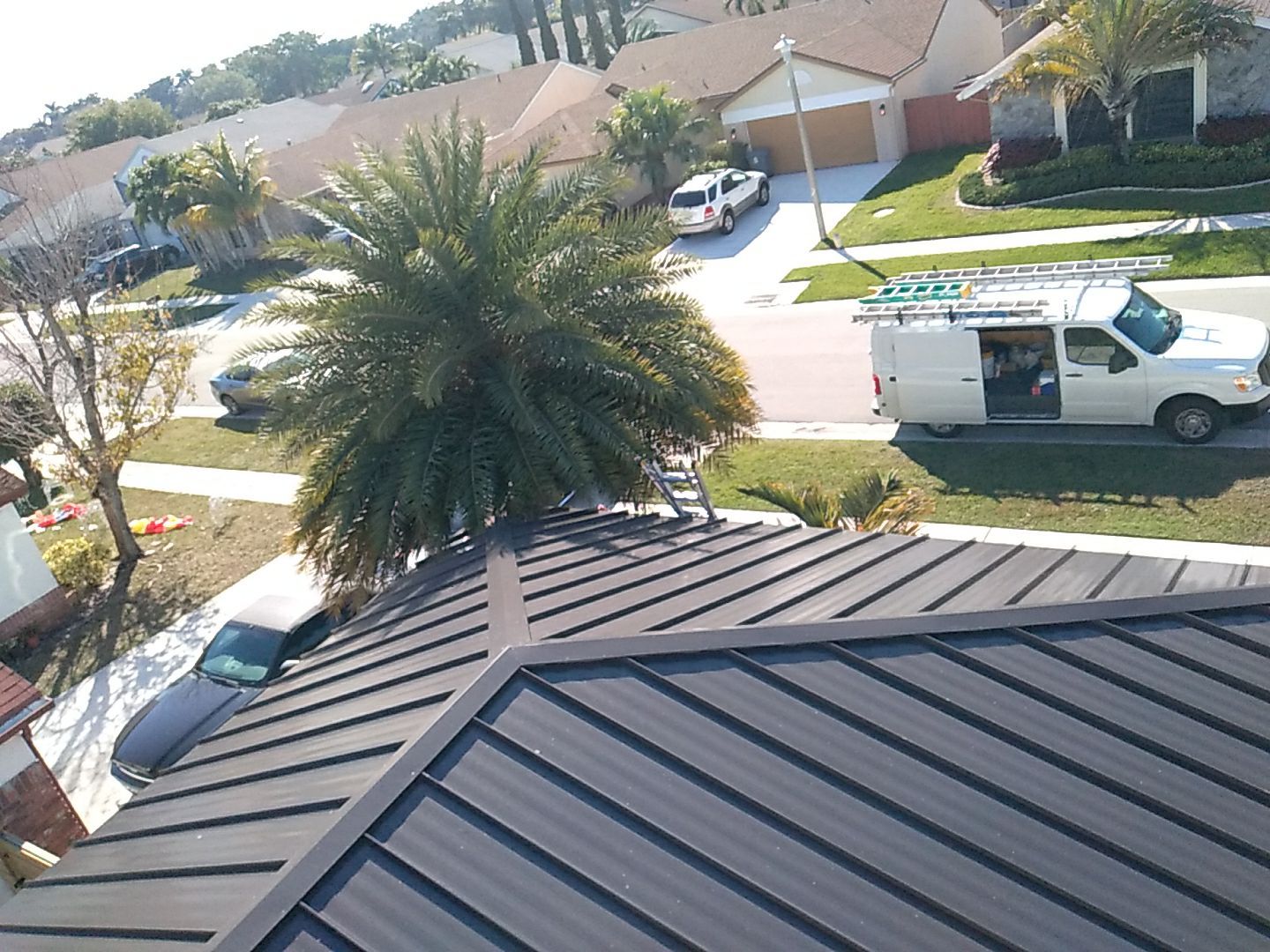 Residential Roofing Installation using 1" Nail strip metal roof by BLUES BROTHERS ROOFING