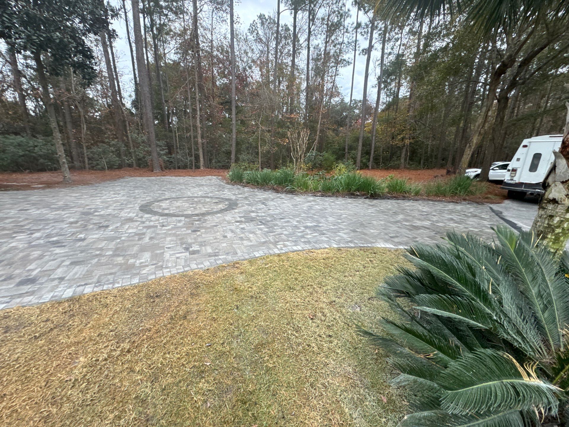 Custom Paver Driveway and Textured Pool Deck Installation in Hilton Head Island by Lowcountry Scapes, LLC