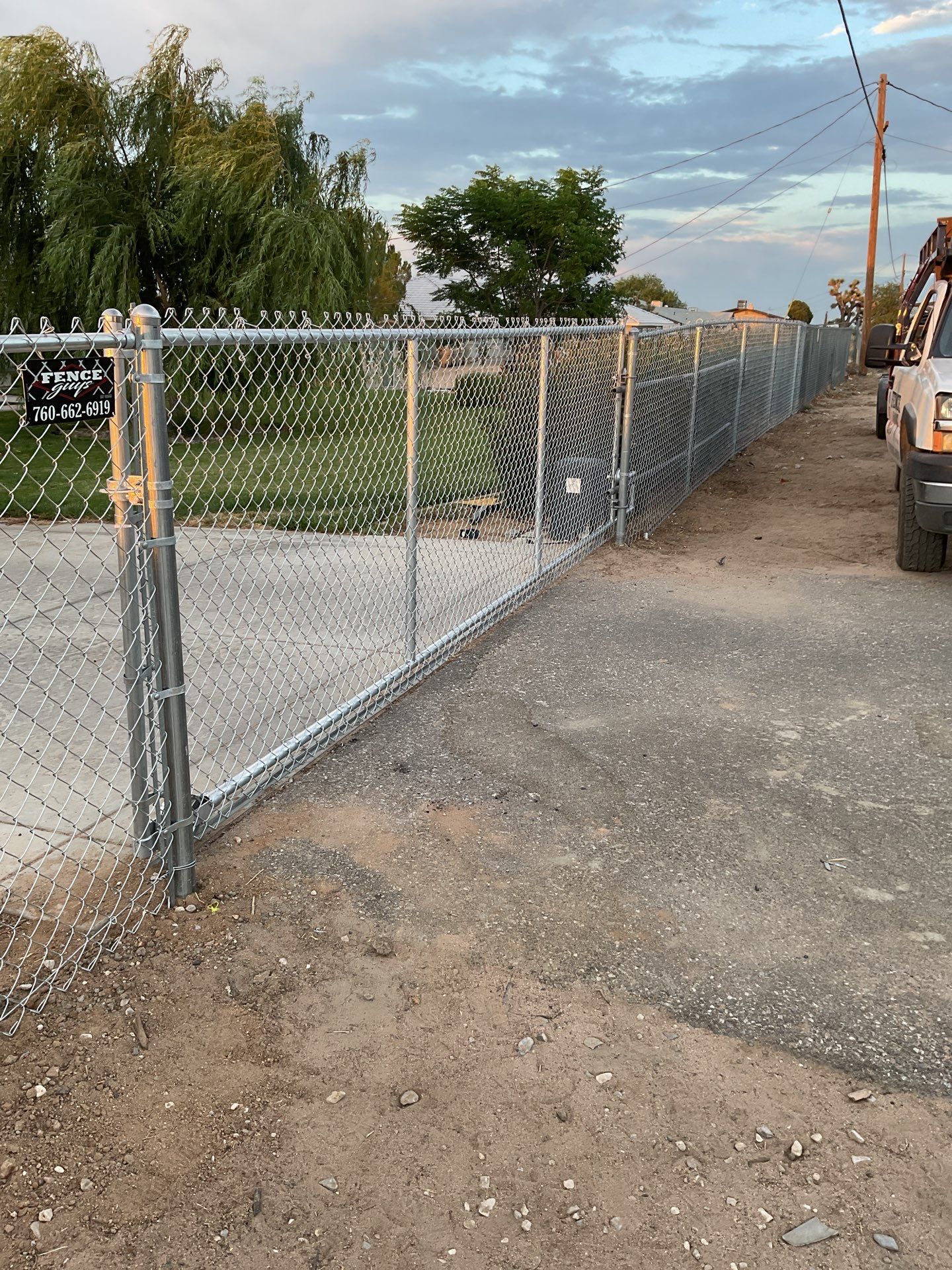 Fence Installation using chain -link by Fence Guys Inc. 