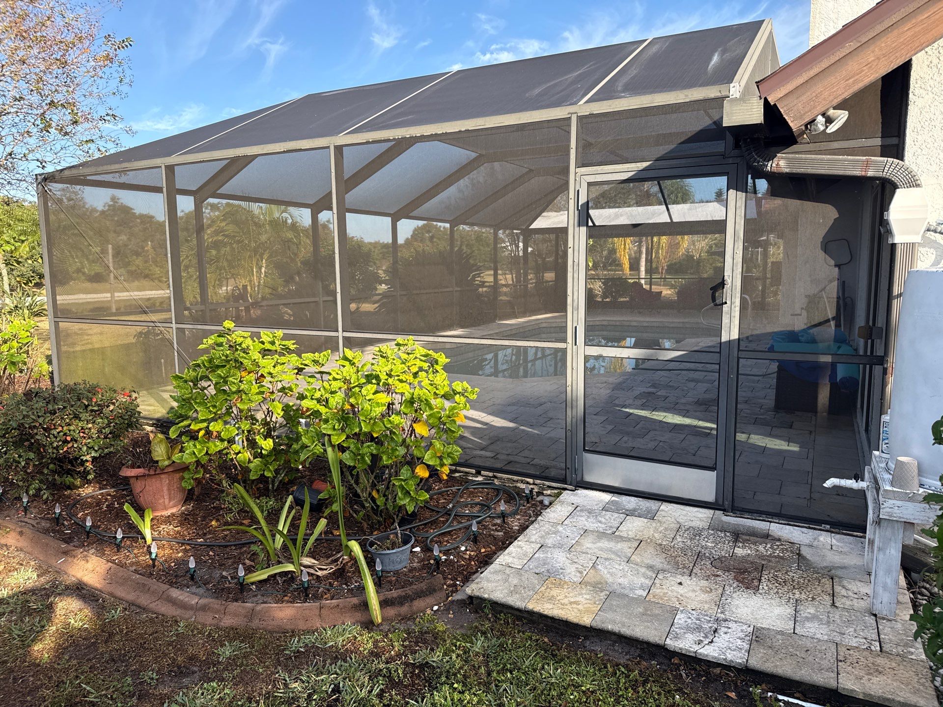 Paver Pool Deck & Screen Enclosure Cleaning | River Wilderness, Parrish FL by Sunshine AquaWash