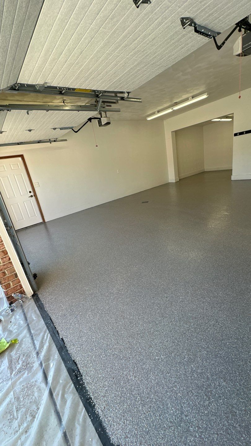 Garage + Sunroom Project in Follansbee by Floors in a Day, Inc