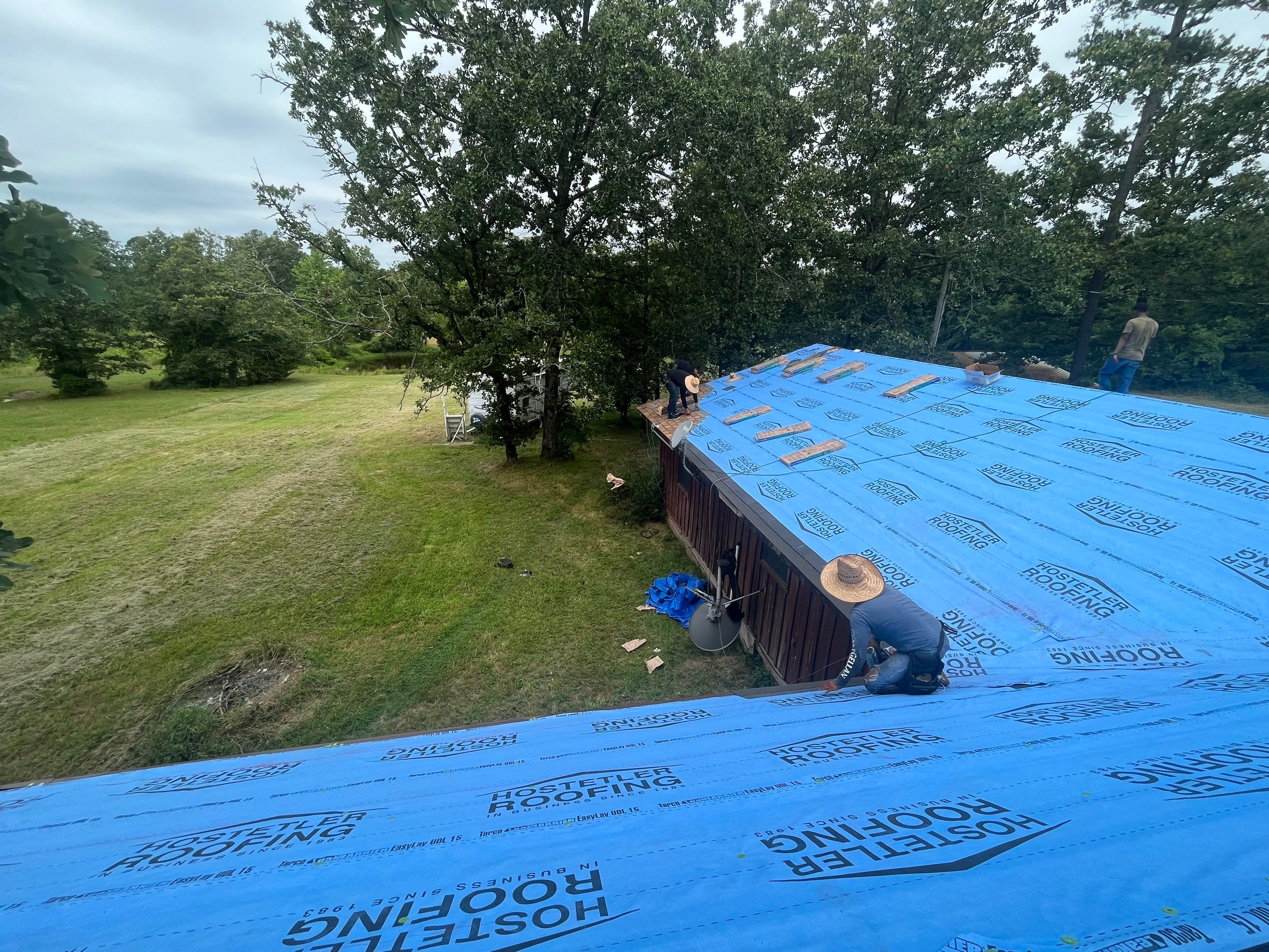 Storm Restoration Reroof: 25 Year 3-Tab Shingle by Hostetler Roofing