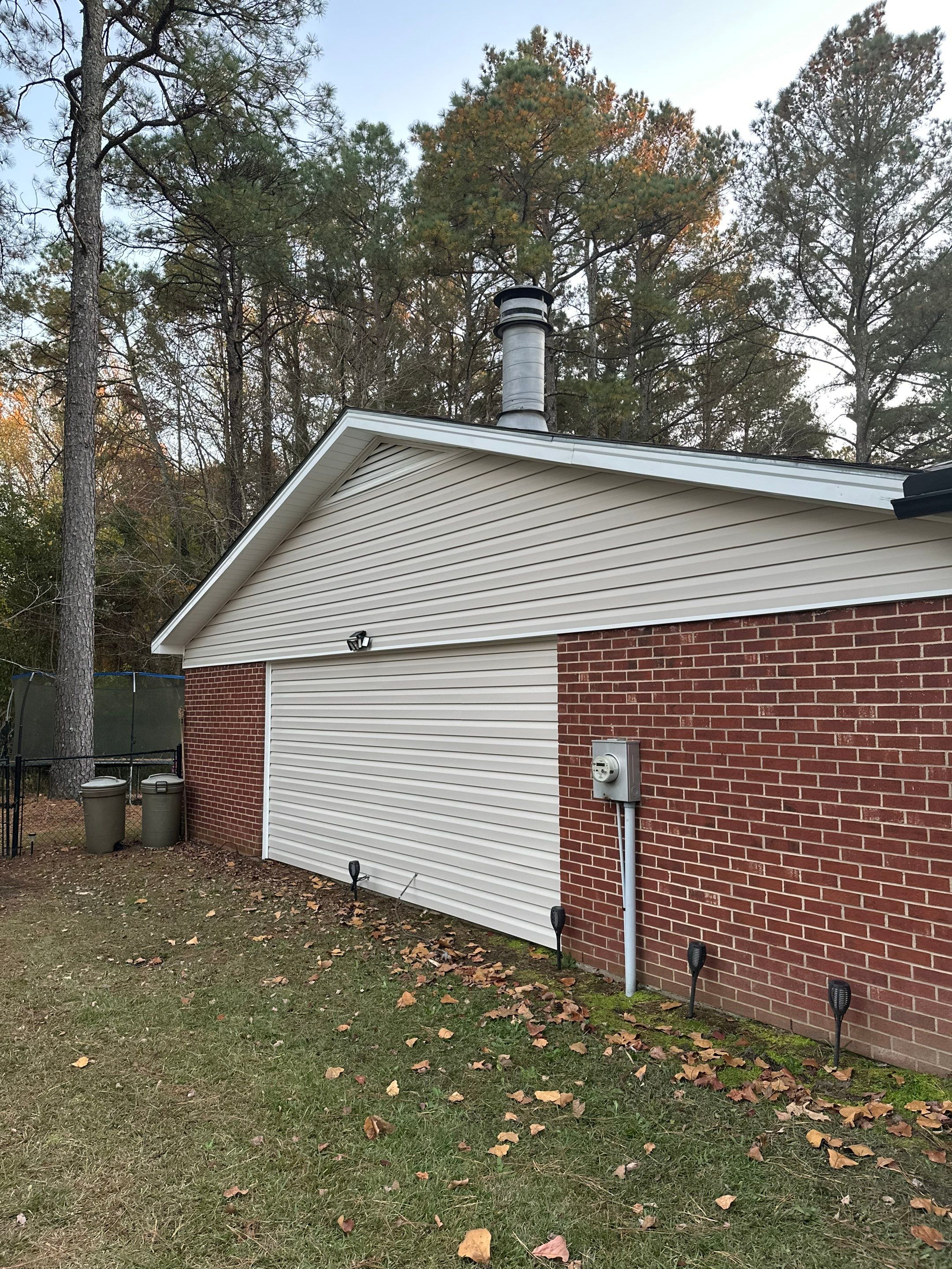 Vinyl Siding Replacement and Trim Capping for Fayetteville Home by The Remodeling Company