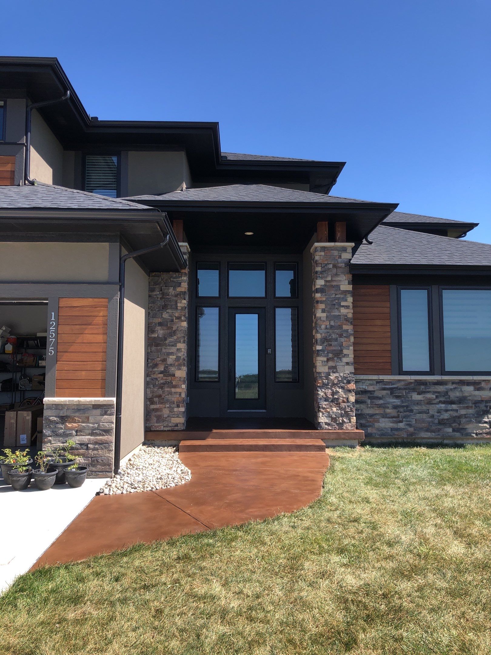 Olathe, KS -- Stoop/Sidewalk Tuscan Overlay by Big Red Decorative Concrete, LLC
