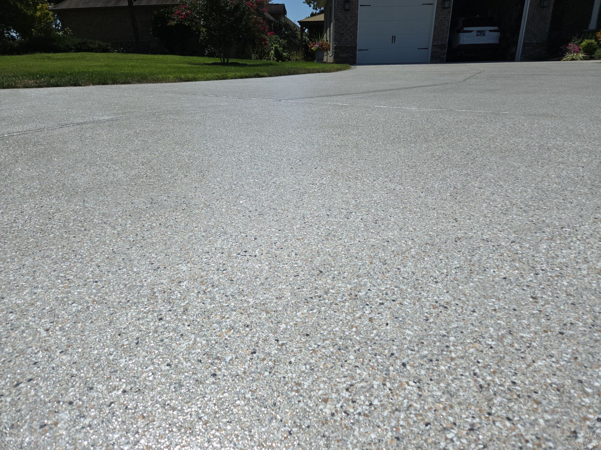 Driveway Improvement Using Claystone With Trail Mix Border! by Elite Floor Solutions