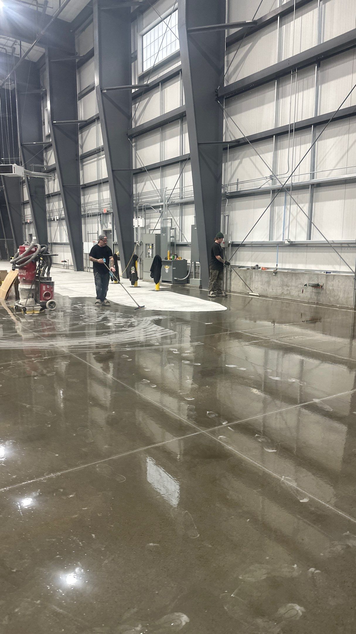 Airplane Hanger using Light Grey Commercial Penntek Epoxy by Croc Coatings, LLC