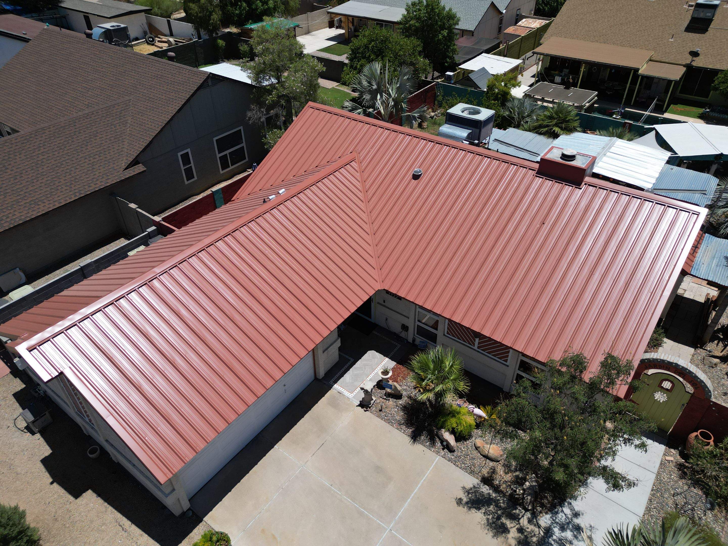 Terra Cotta Exposed Fastener by Reimagine Roofing