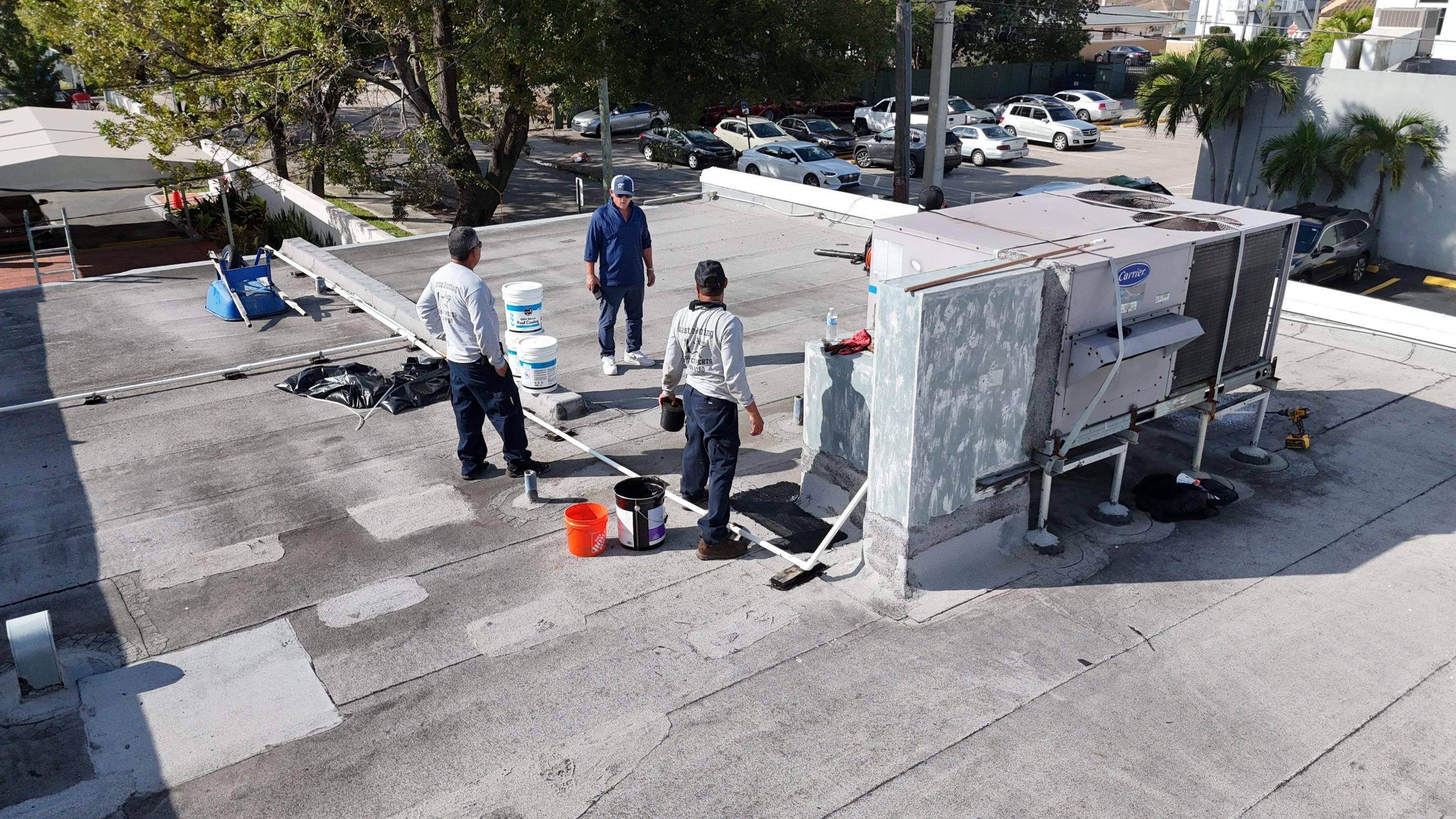 Commercial Flat Roof Restoration Using Silicone Coating in Hallandale Beach by Aastro Roofing