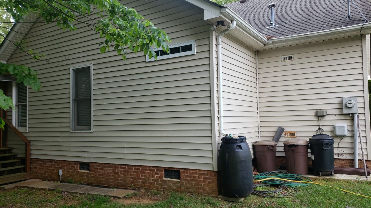 House Wash using cleaner by Power Wash Masters LLC