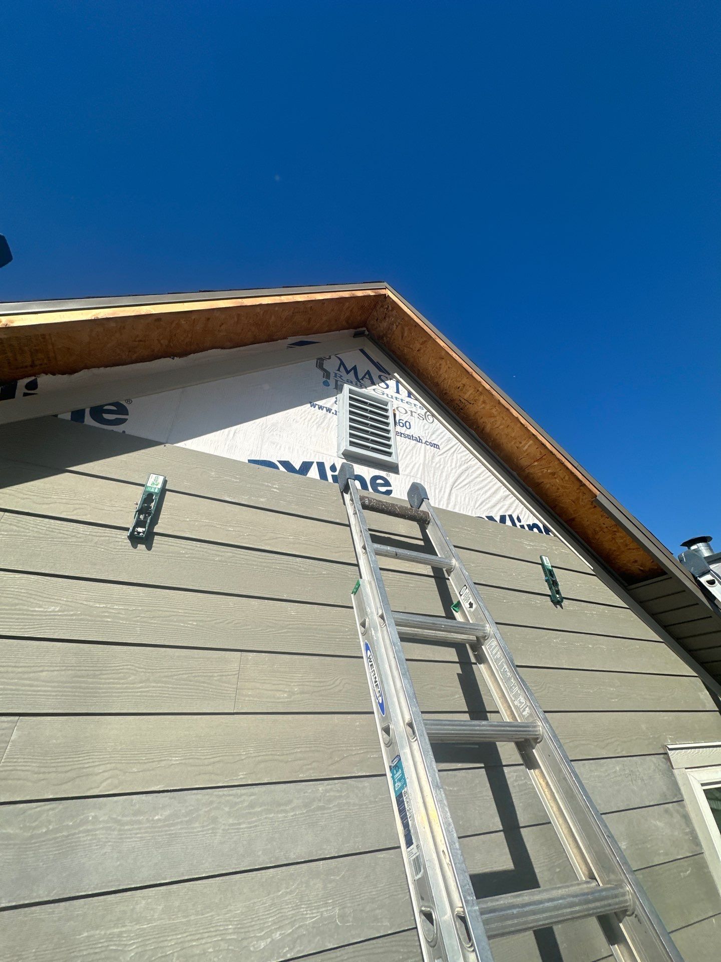 Siding in Lindon by Master Rain Gutters.