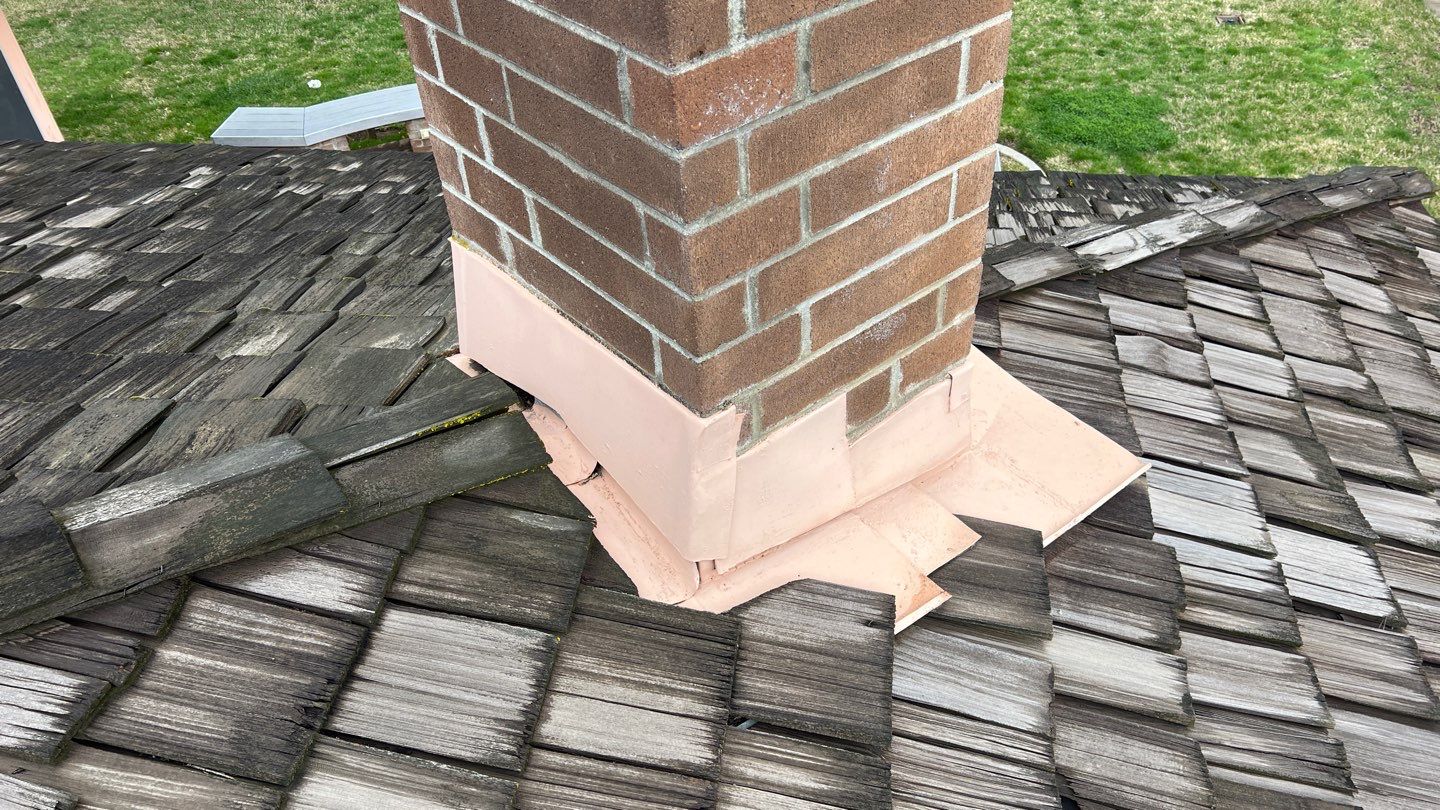 Installation of Certainteed Presidential shingles on residential house by Straight Edge Roofing Inc