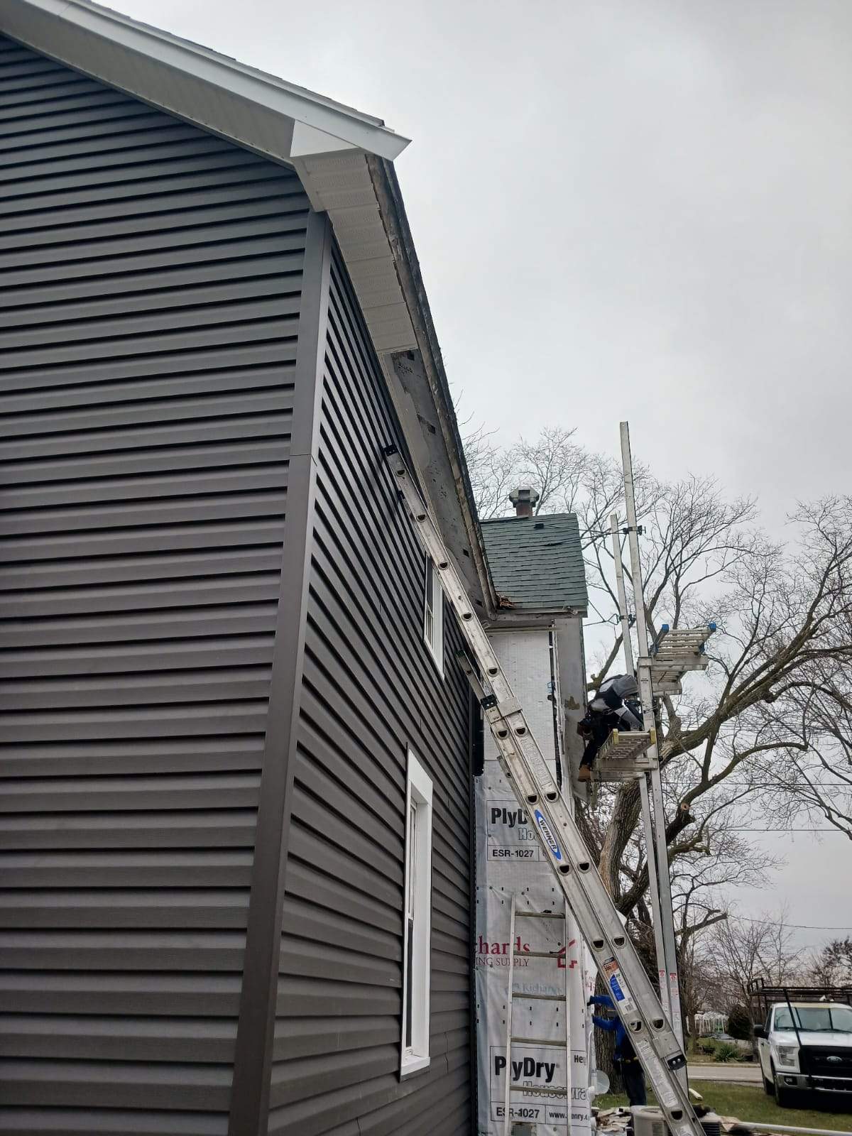 Residential fascia replacement using Exterior Portfolio 4.5 DL - Peppercorn by Nitro Roofing and Construction