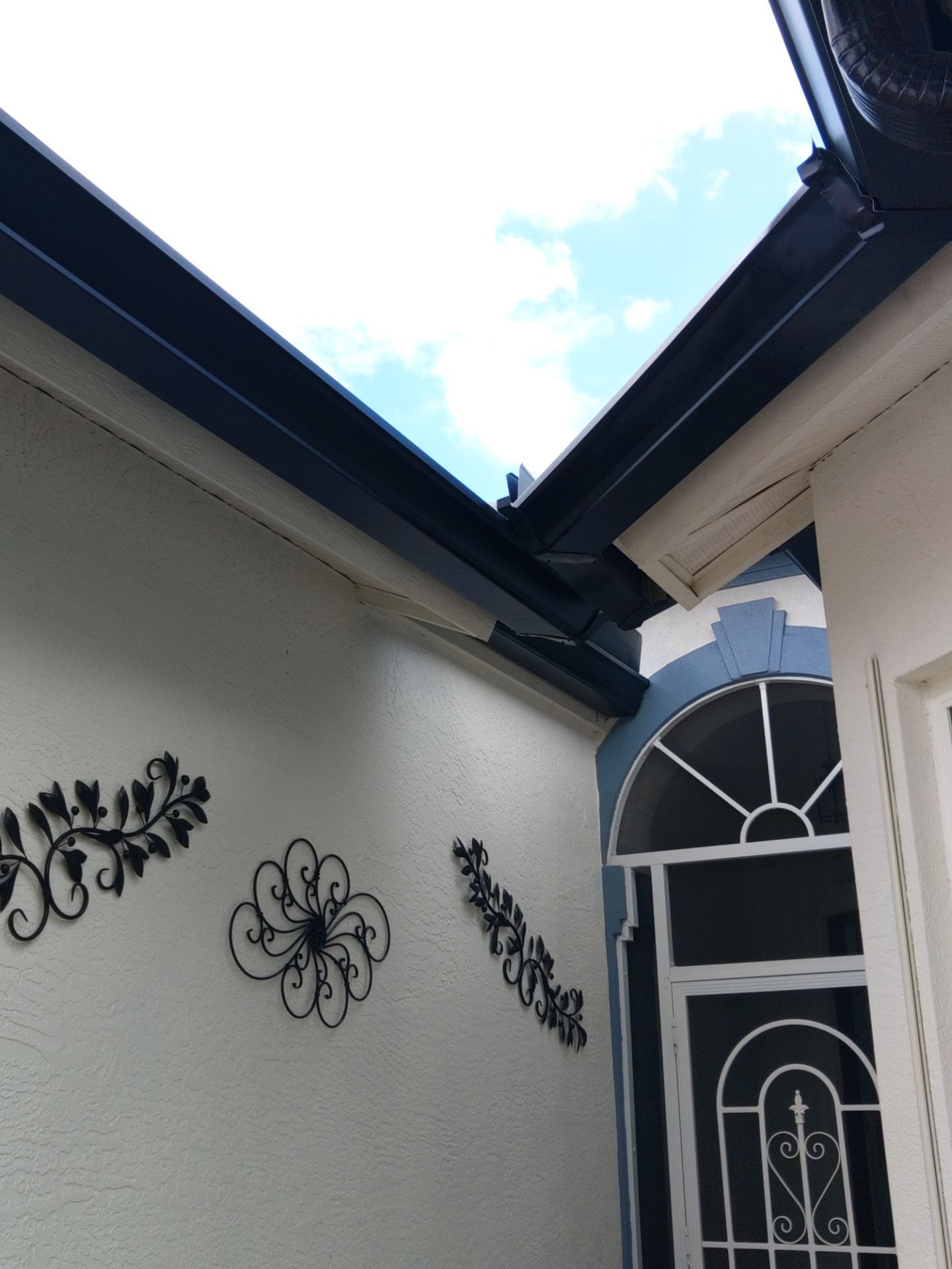 Black Seamless Gutters  by Gutter Professors