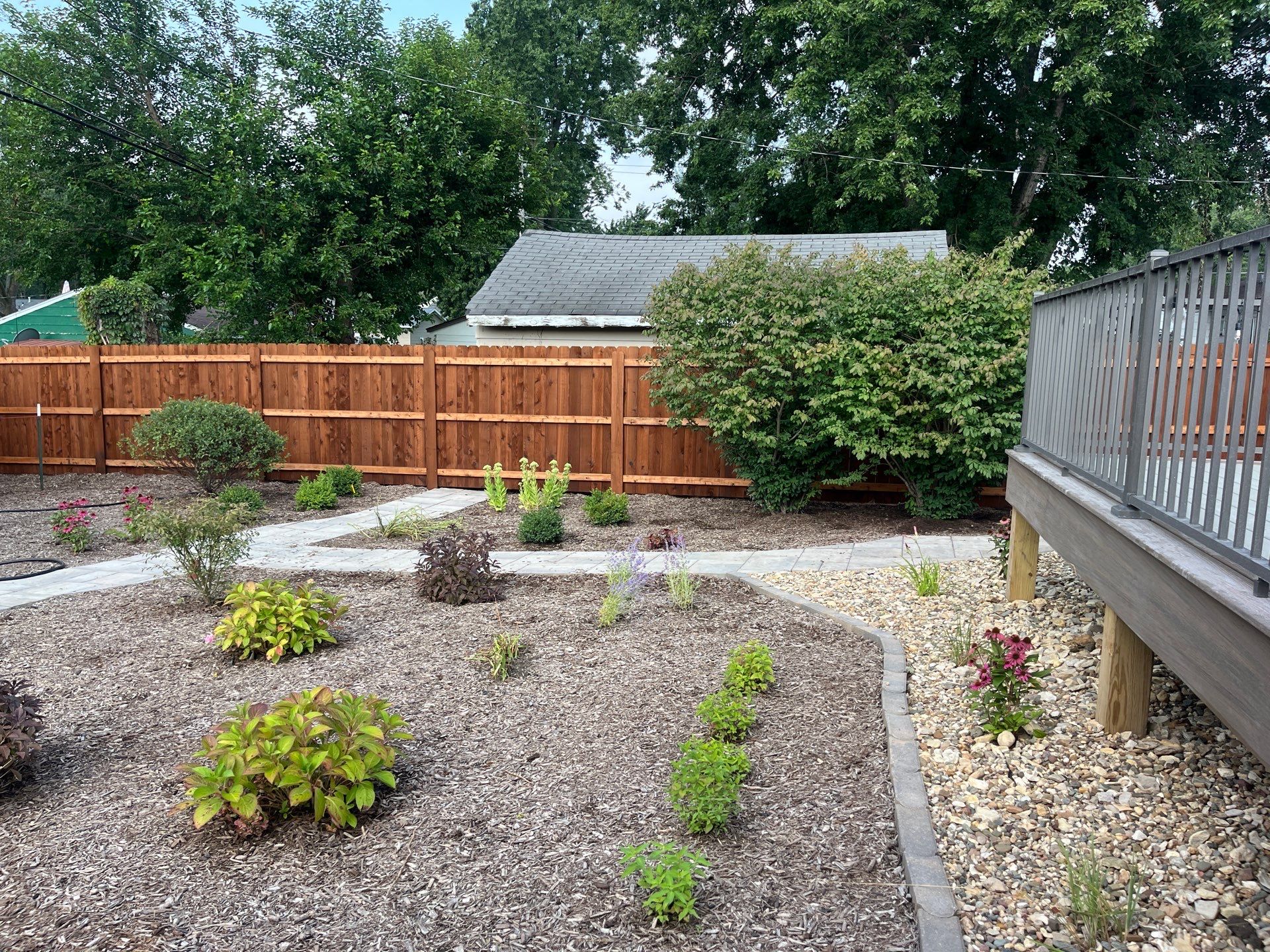 Custom Chestnut Stained Cedar Privacy Fence in Waterloo by Perfect Picket Fence and Stain