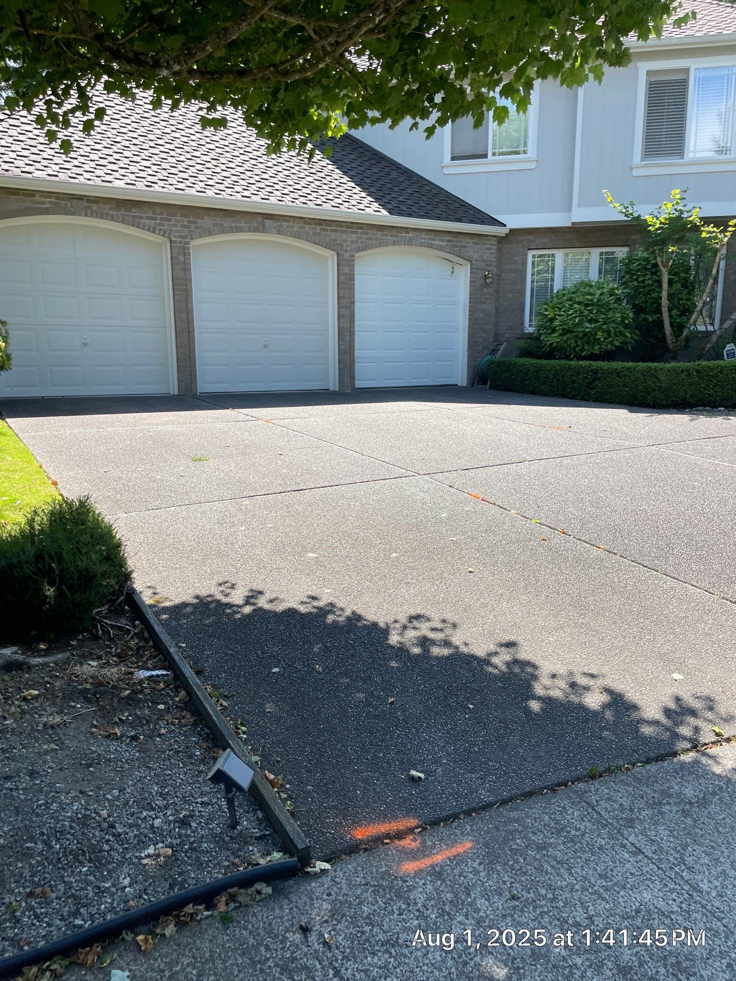 Multi-color Stamped & Sealed Concrete Driveway Renovation | Mukilteo by Jireh Asphalt & Concrete Inc