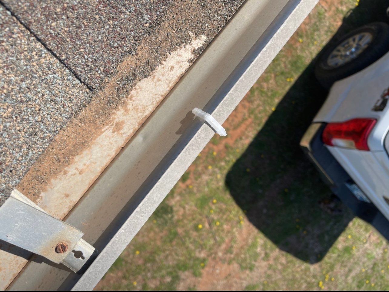 Hail Damage on a Roofing System by Icon Roofing And Construction 