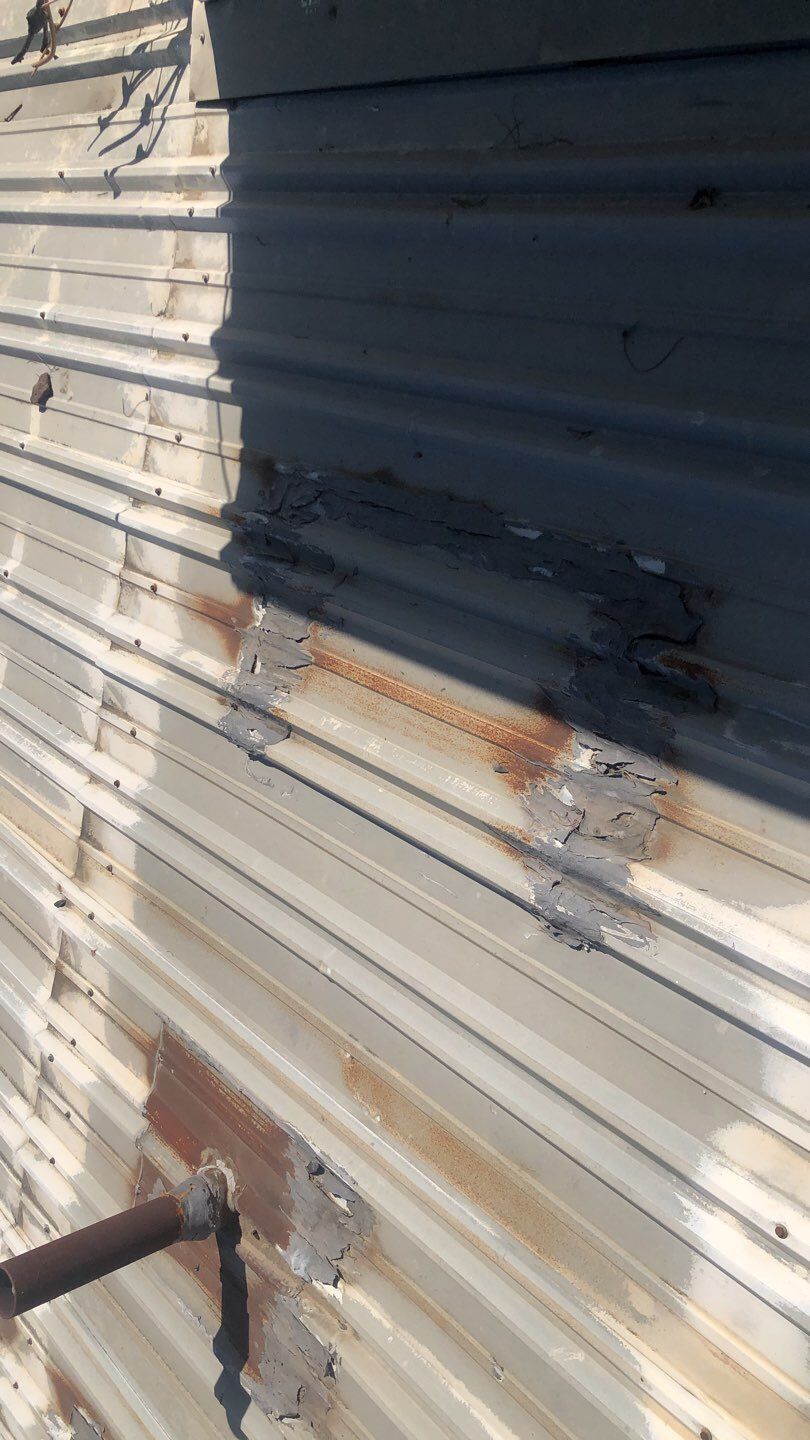 Metal Restoration Roofing system with Benchmark/PUMA XL 20 yr warranty by Straight Edge Roofing Inc