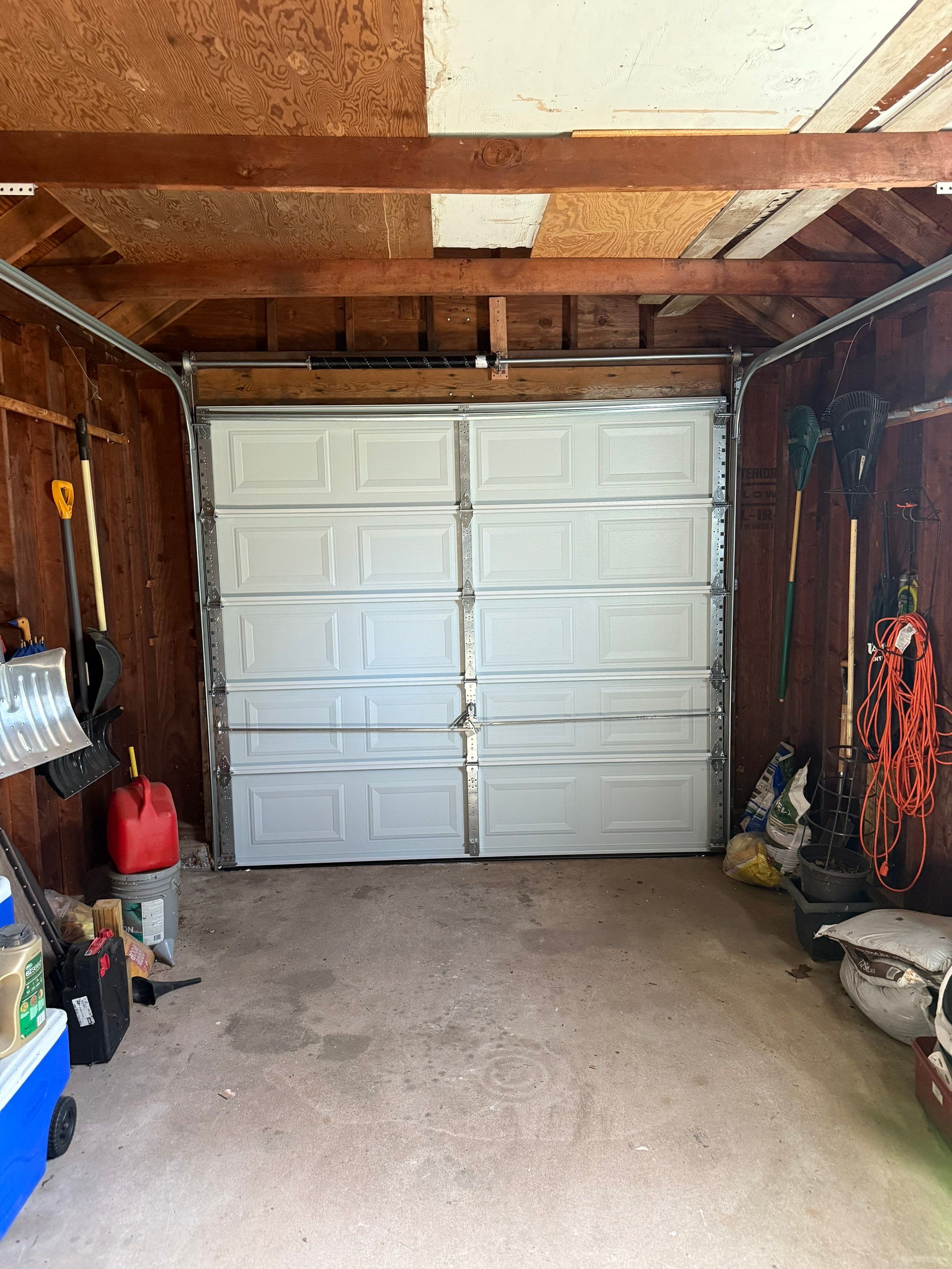 Garage Door Refresh with Improved Function & Clean Finish by DiGiorgi Roofing and Siding Inc