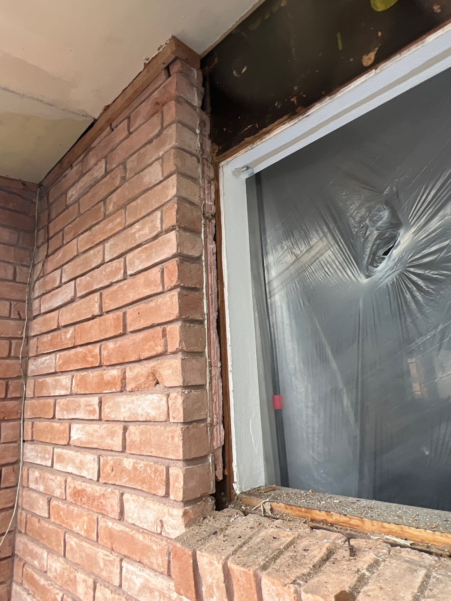 Windows in Brick with a Bay Window by Bayfront Roofing and Construction