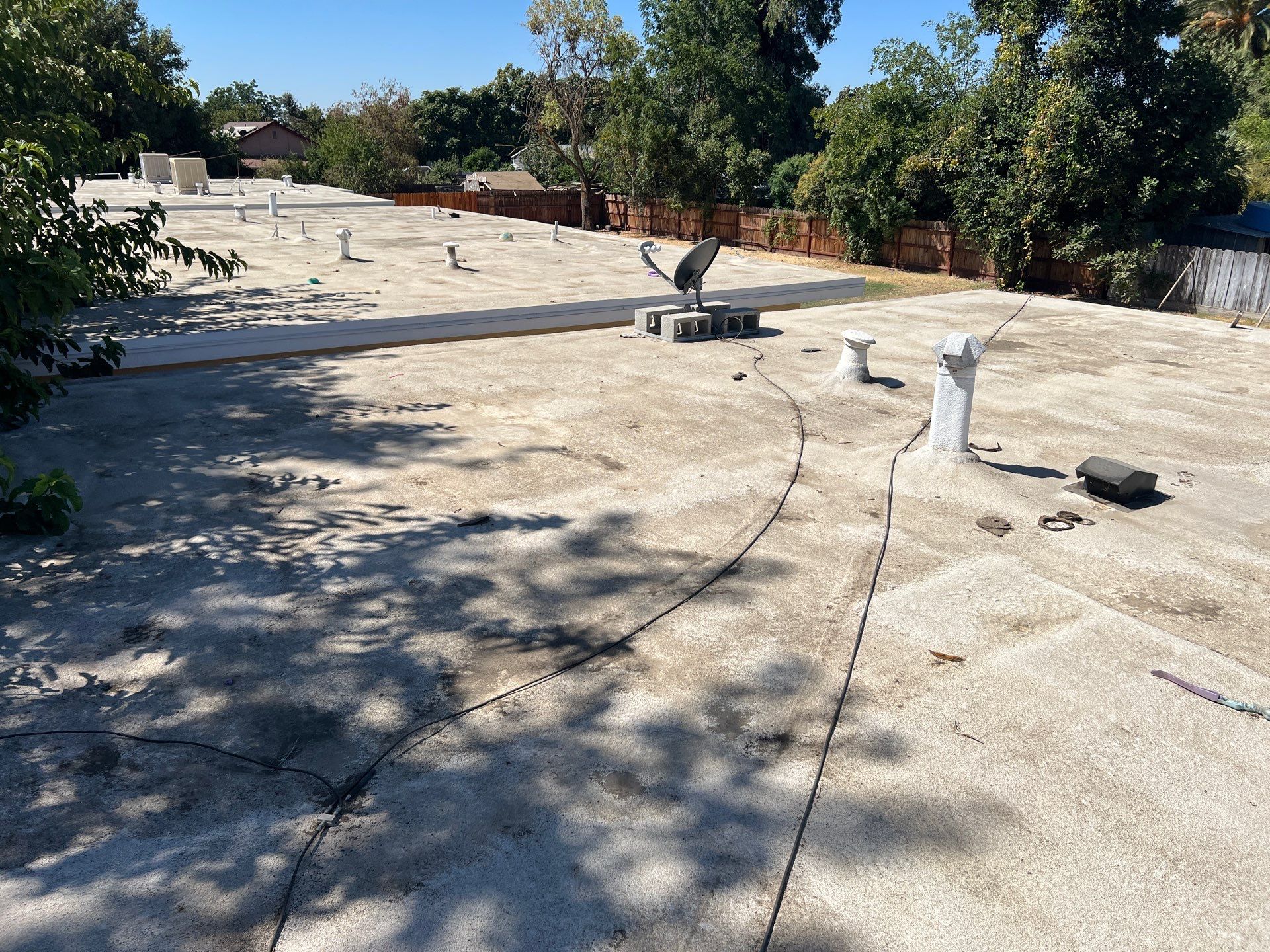 Foam Refurbish using Conklin Benchmark/PUMA XL coatings and spray foam by Straight Edge Roofing Inc