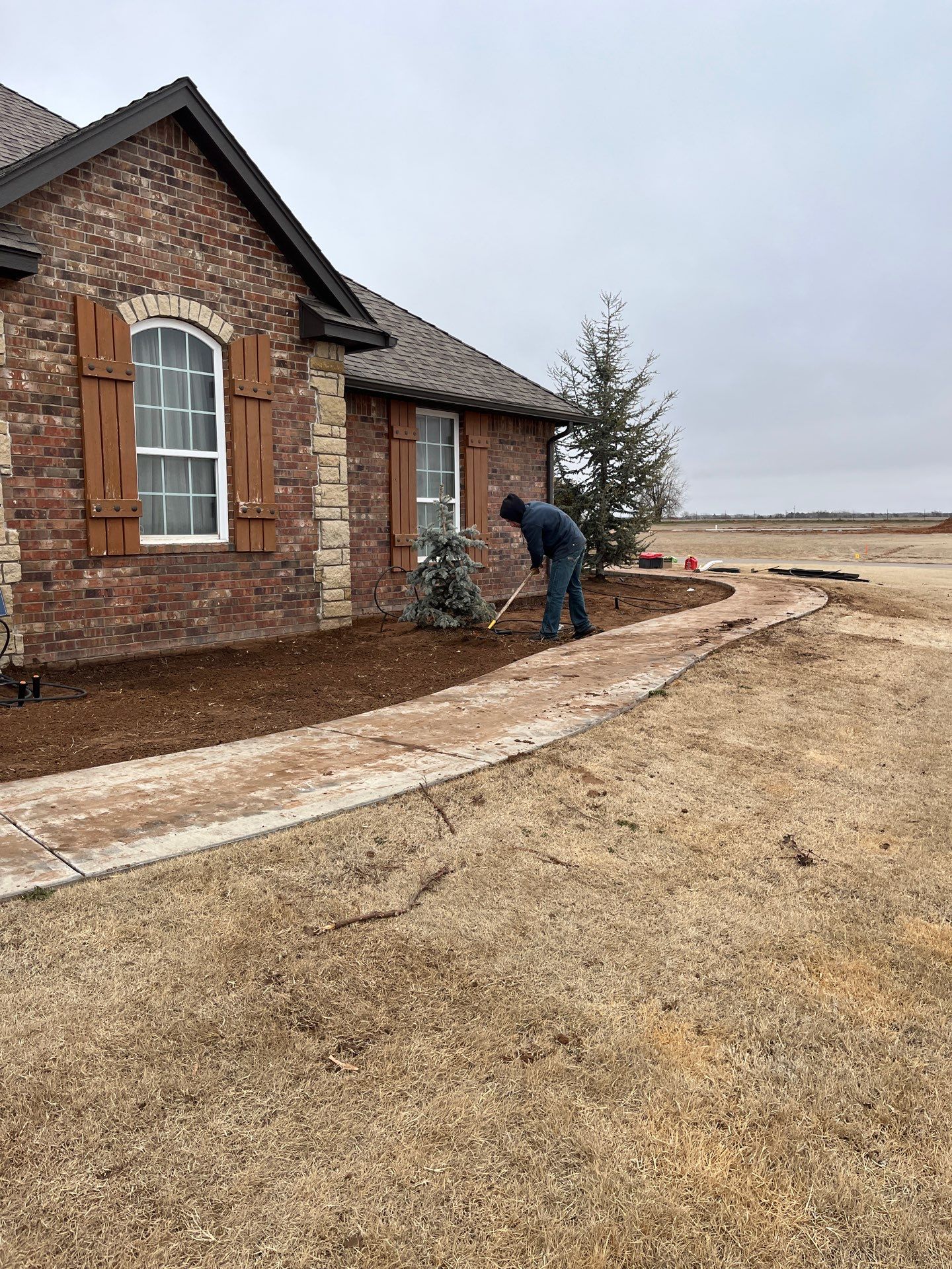Landscape installation w/ irrigation and landscape lighting by Clays Services Inc