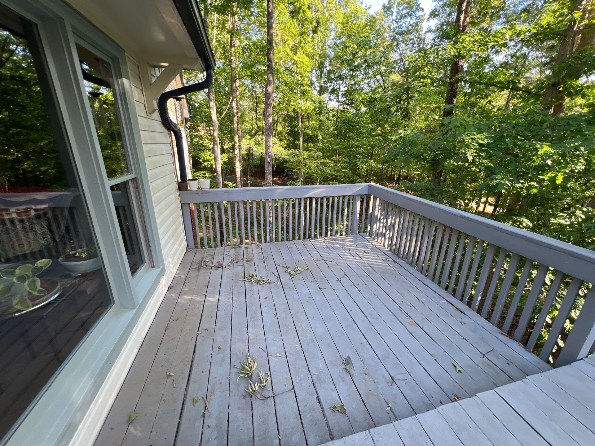 Pressure-Treated Wood Deck Resurfacing and Staircase Reconstruction in Canton by Swift Home Renovations