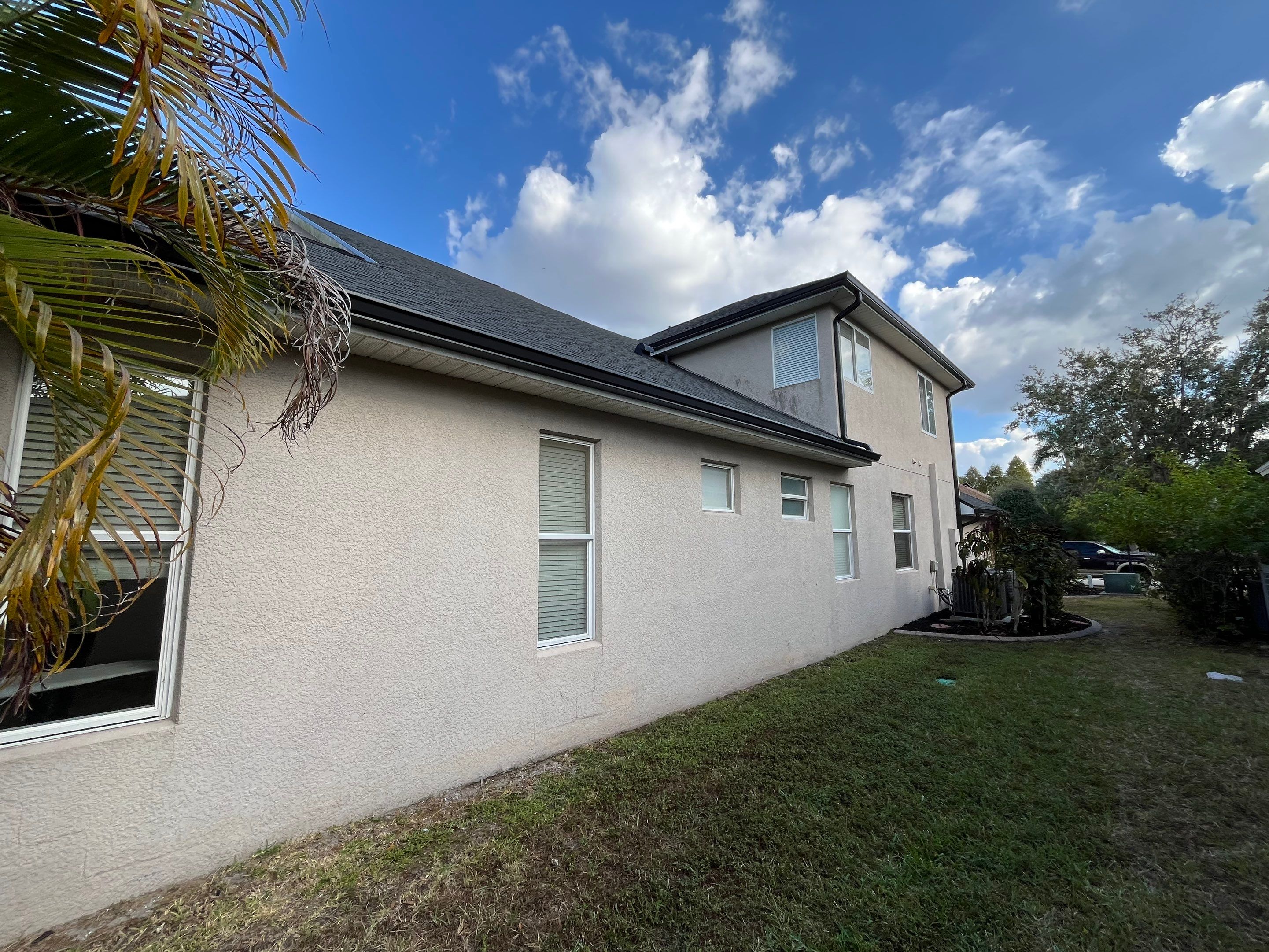 Black 6-inch Seamless Gutters for Modern Ellenton Homes FL by Gutter Professors