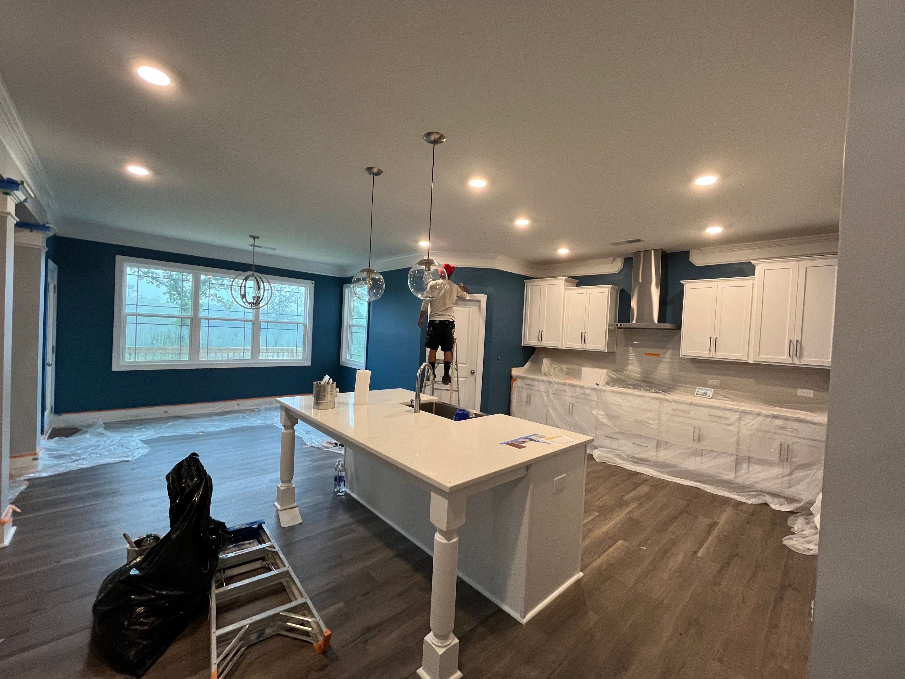 Interior Paint and Bamboo Flooring Install by Thompson Industrial