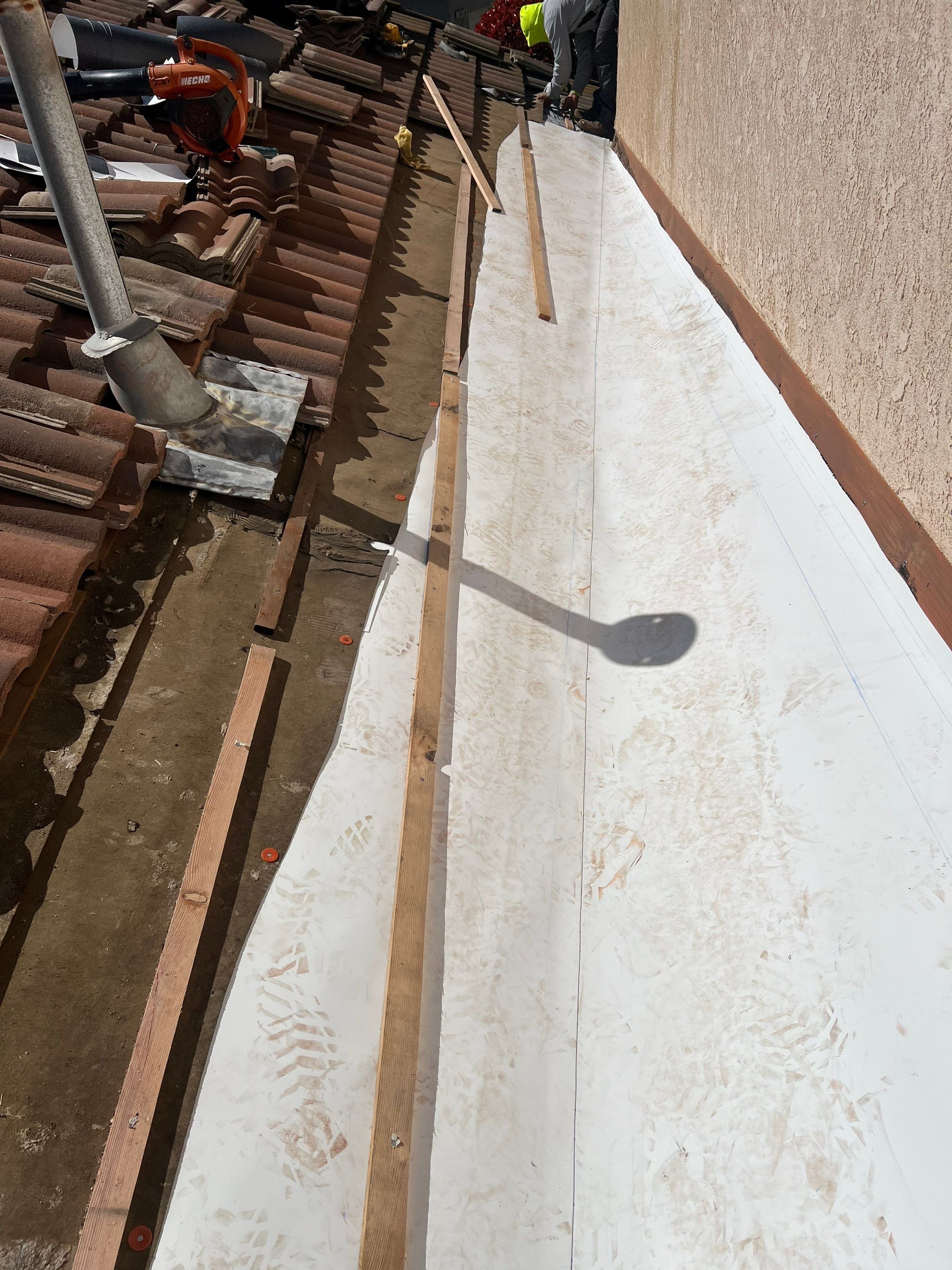 Tile Roof repair by Grandmark Service Company