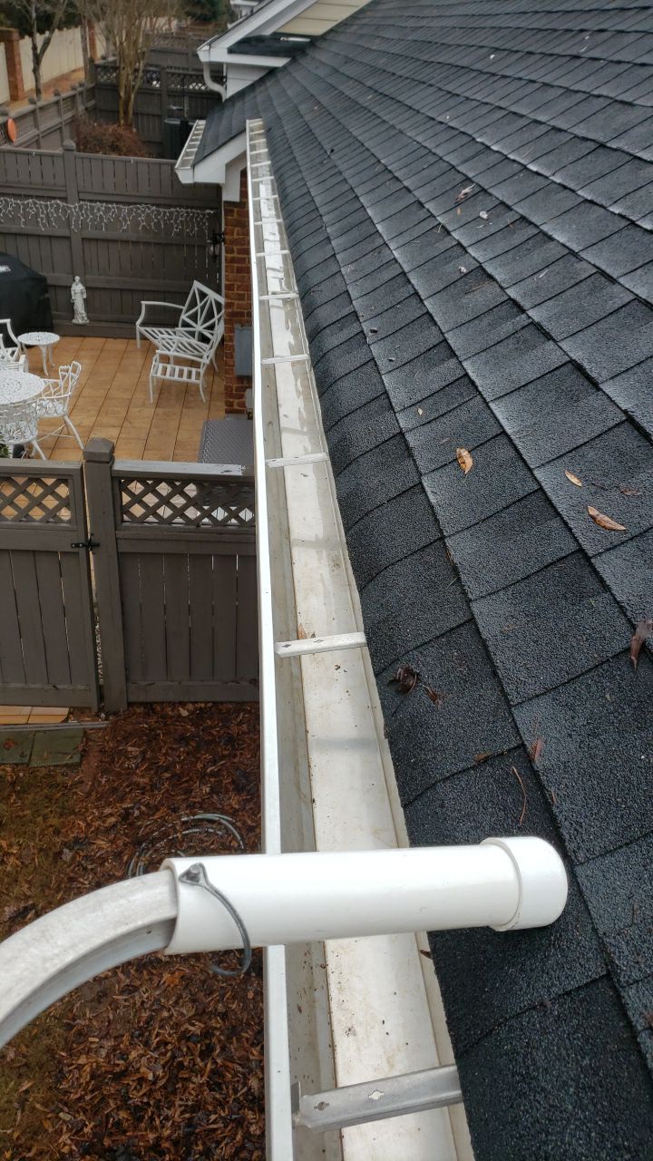 Gutter Cleaning using water by Power Wash Masters LLC