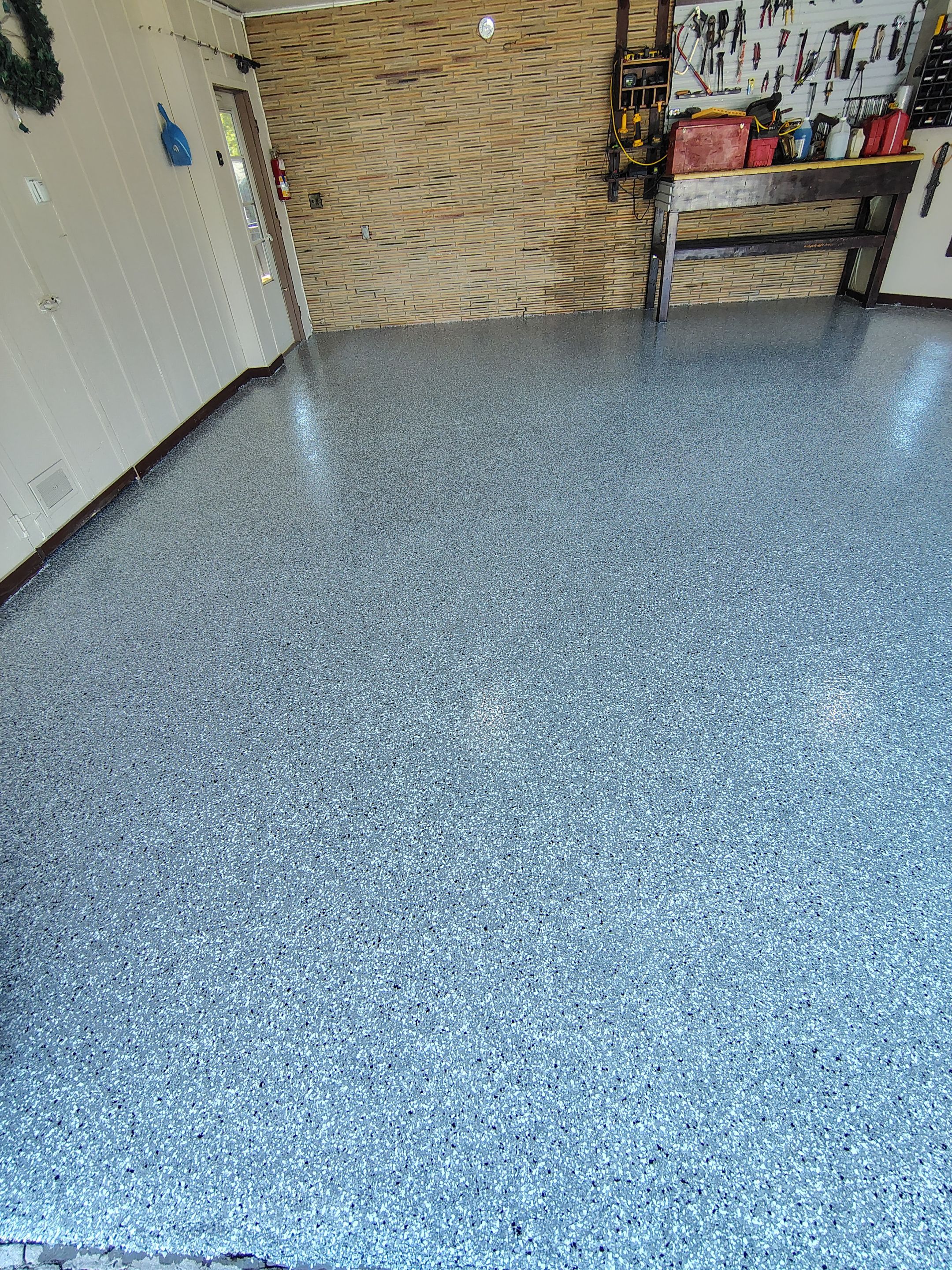Garage Floor Coating with Crack Repair in Yankton by Select Painting, Coatings & Garage Cabinets