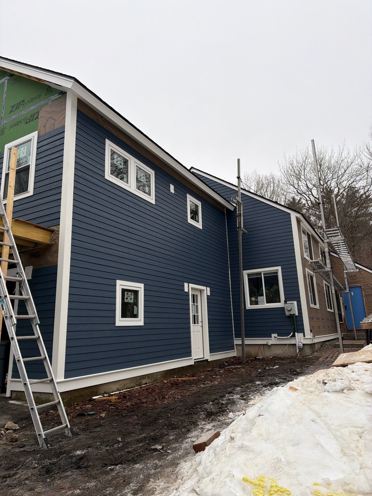 Custom ADU Construction with Vaulted In-Law Suite – LP SmartSide®, ZIP System® & Harvey® Windows by Sensible Home Solutions