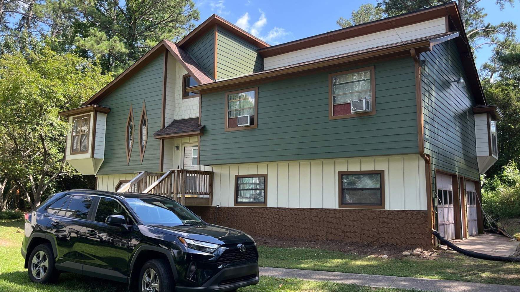 Snellville,GA Siding Replacement and Multi-Colored Exterior Painting by Nelson Exteriors
