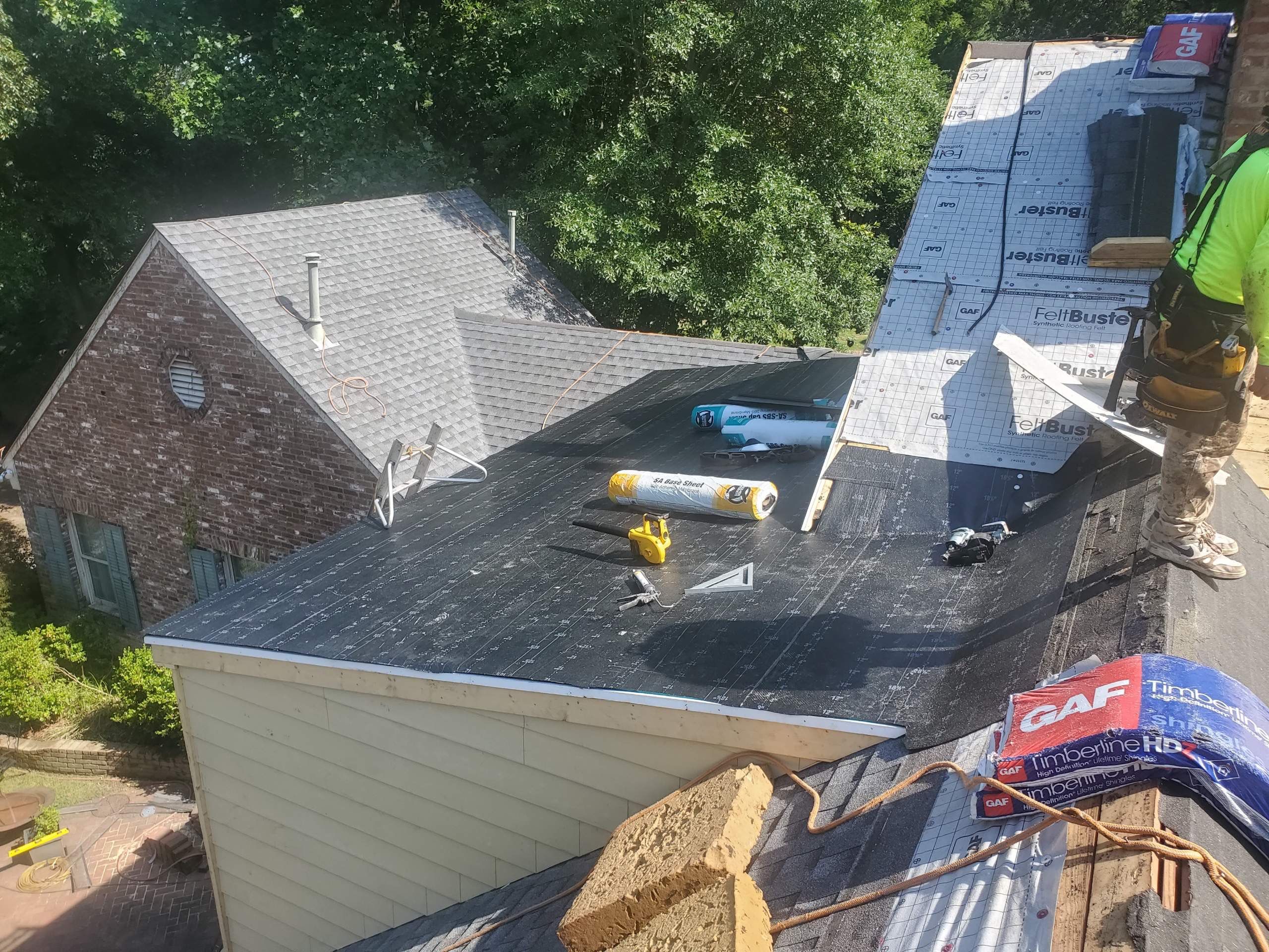 Full Roof Replacement with gutter upgrade after tree impact damage in East Memphis by Revival Roofing Services