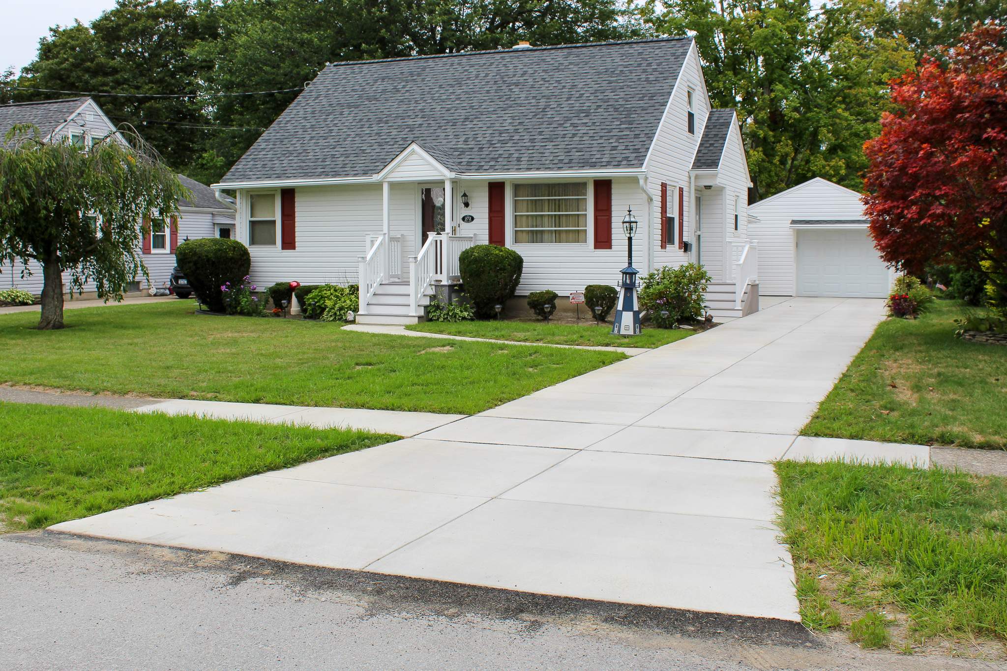Exterior Renovations- Roofing, Siding, Concrete, and Railings  by Ivy Lea Construction