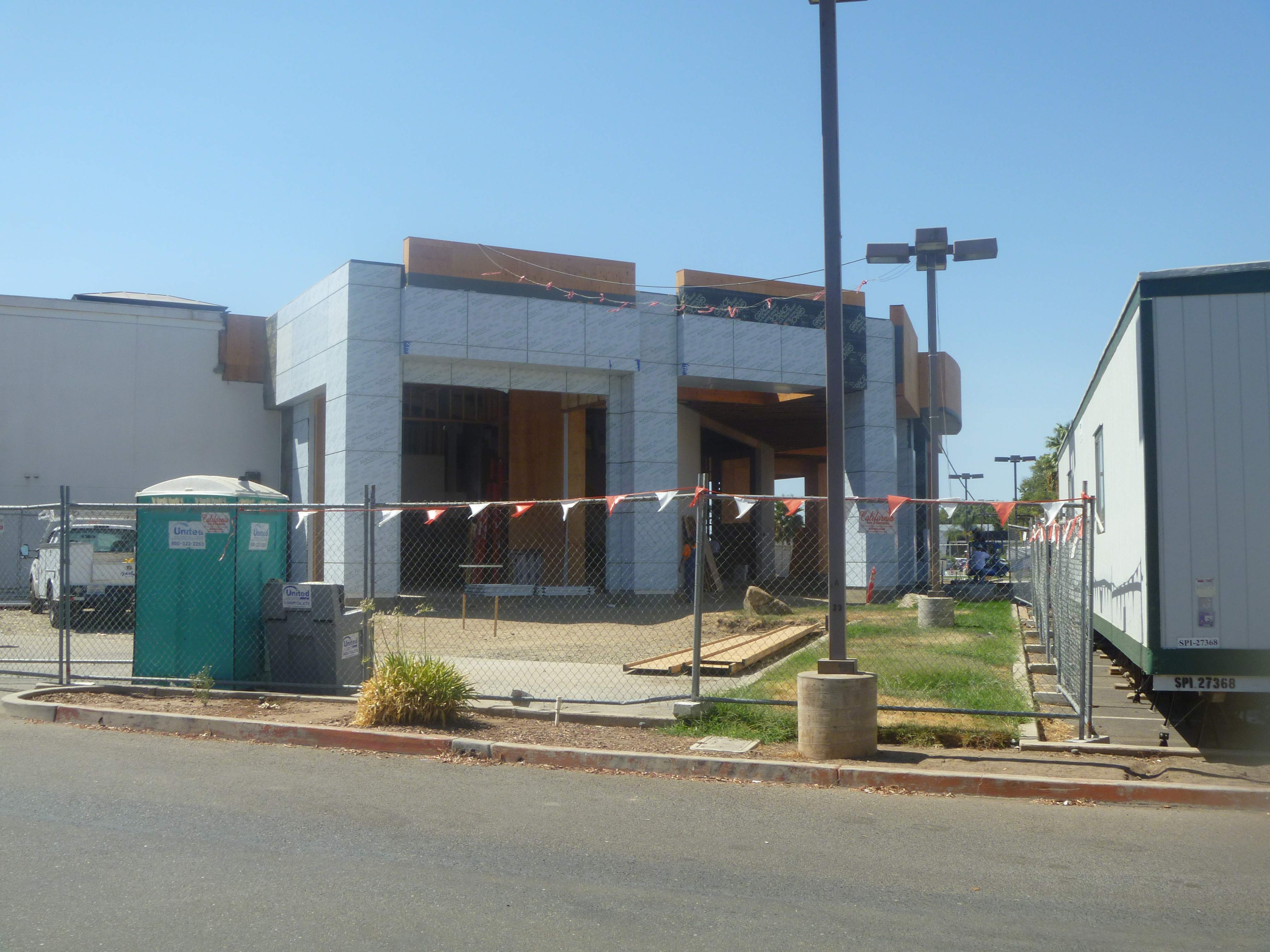 Commercial Roofing Installation using Spray foam and Conklin Benchmark/PUMA XL 18 yr warranty coatings by Straight Edge Roofing Inc