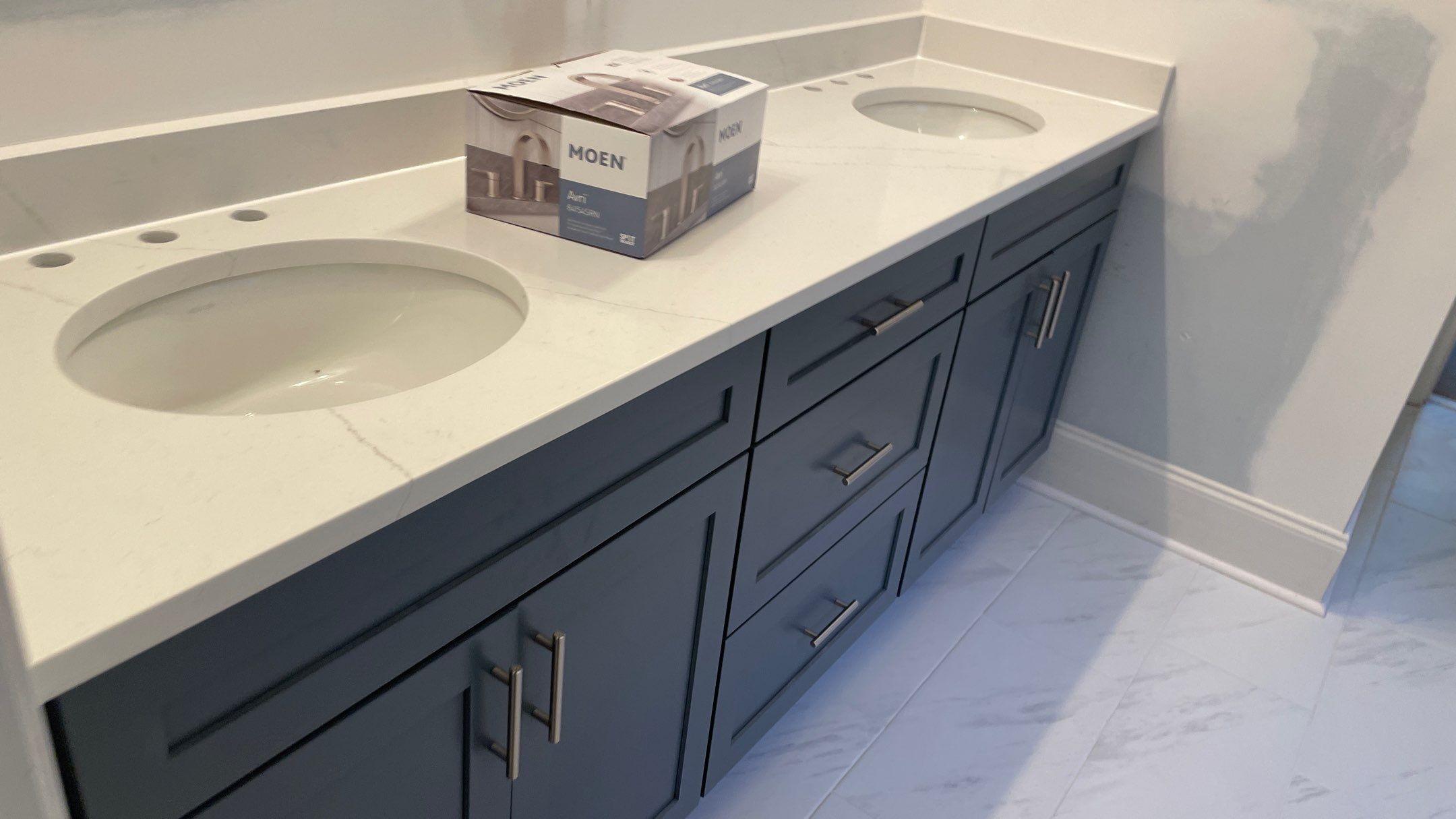 Bright Bathroom Remodel with Wall Removal, Stand Alone Tub and New Vanity by Footprints Floors of Coastal Carolina